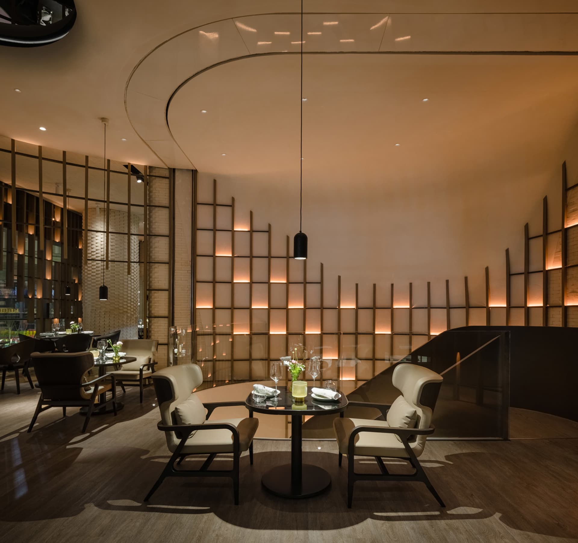 Modern restaurant interior with wooden and glass materials