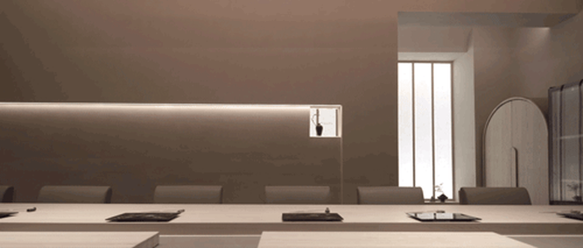 Furniture arrangement featuring minimalist design in a concrete office lounge