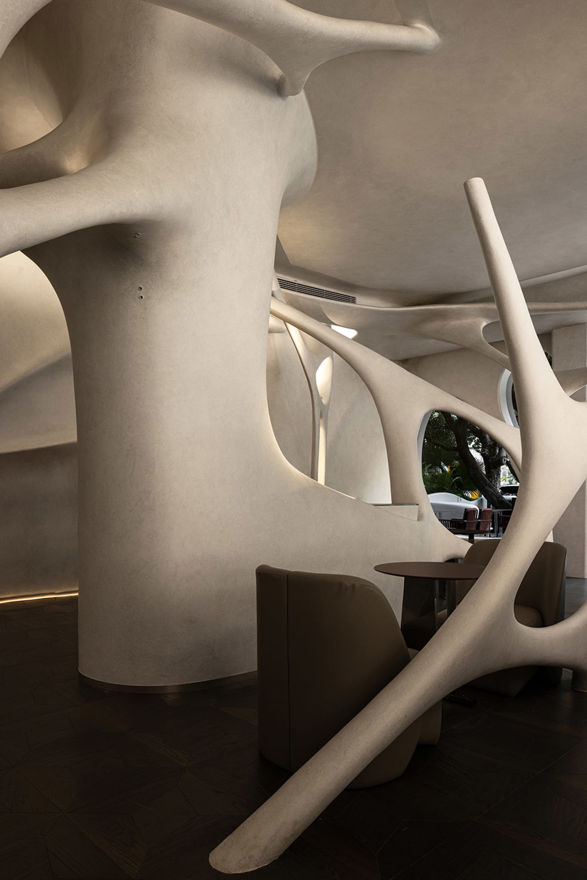 Modern restaurant interior with concrete and steel features