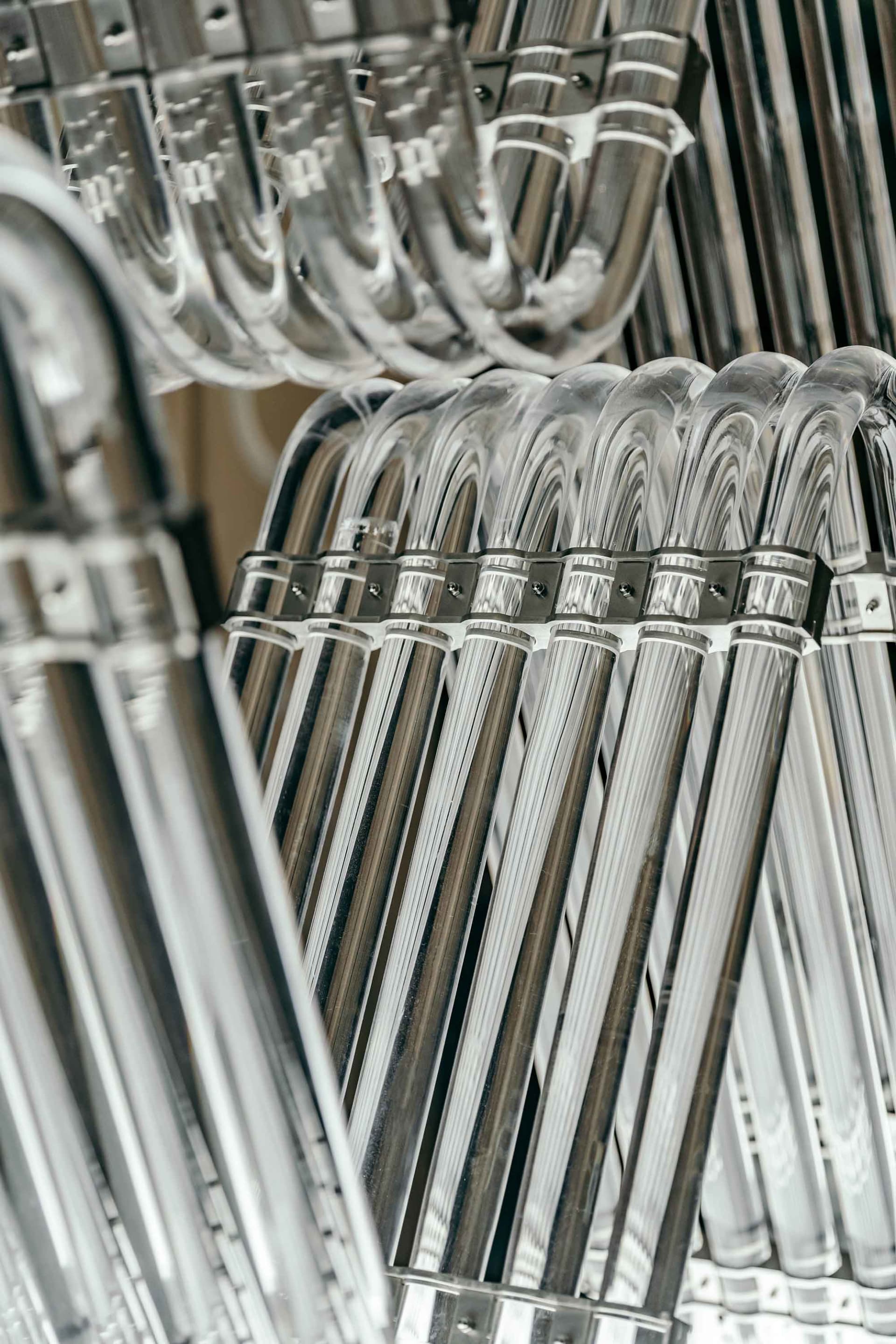 A minimalistic architectural design featuring metal rods.