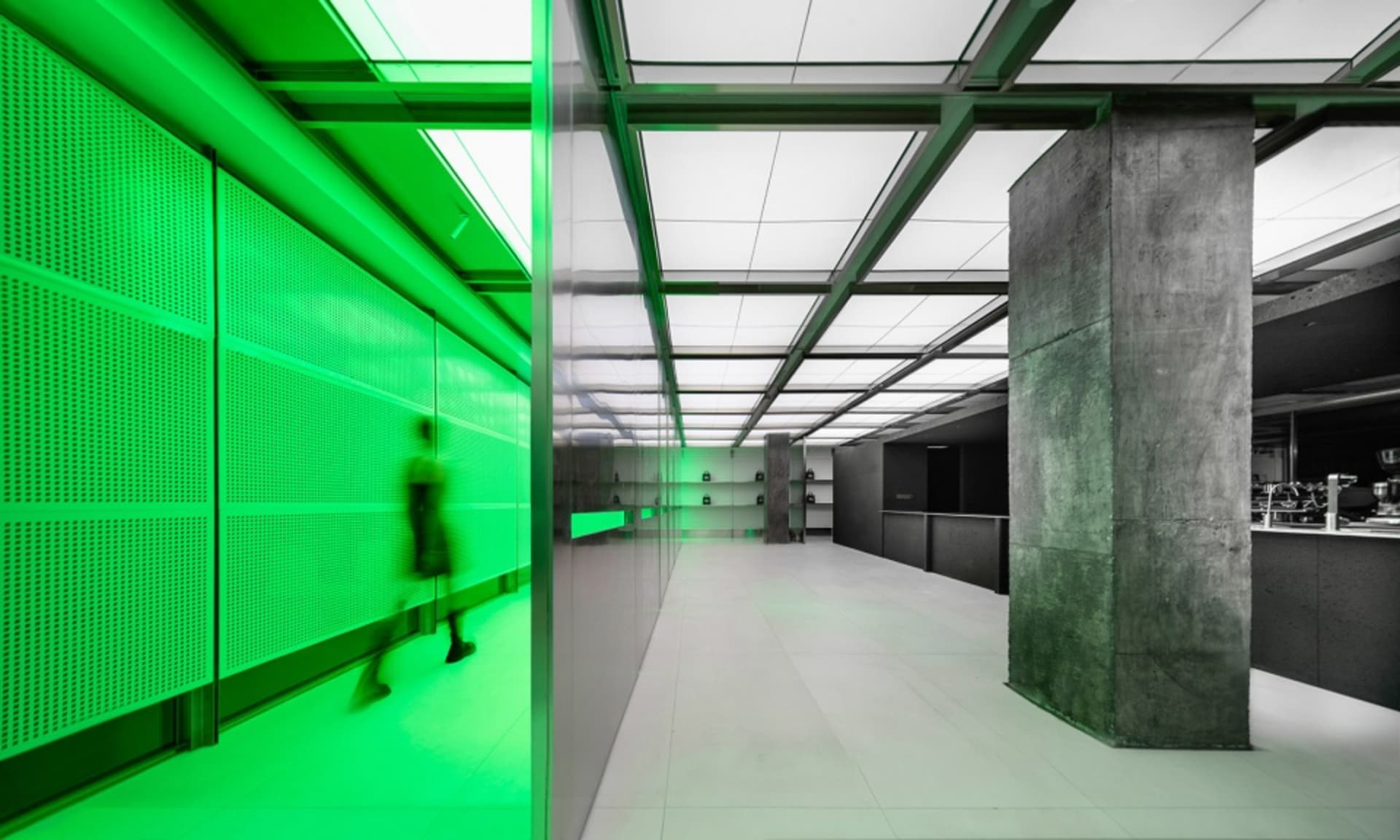 A modern office space with concrete walls and flooring.
