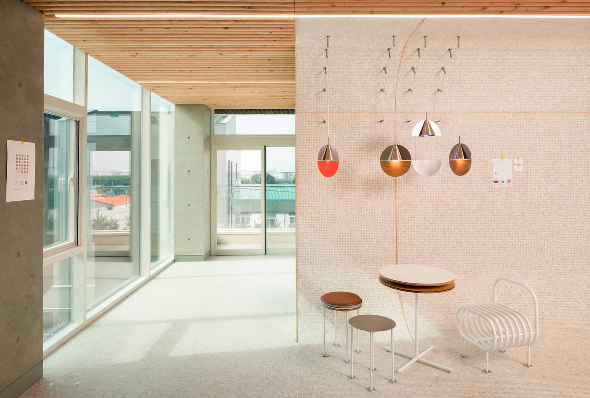 Modern office space featuring concrete, wood, and tile materials