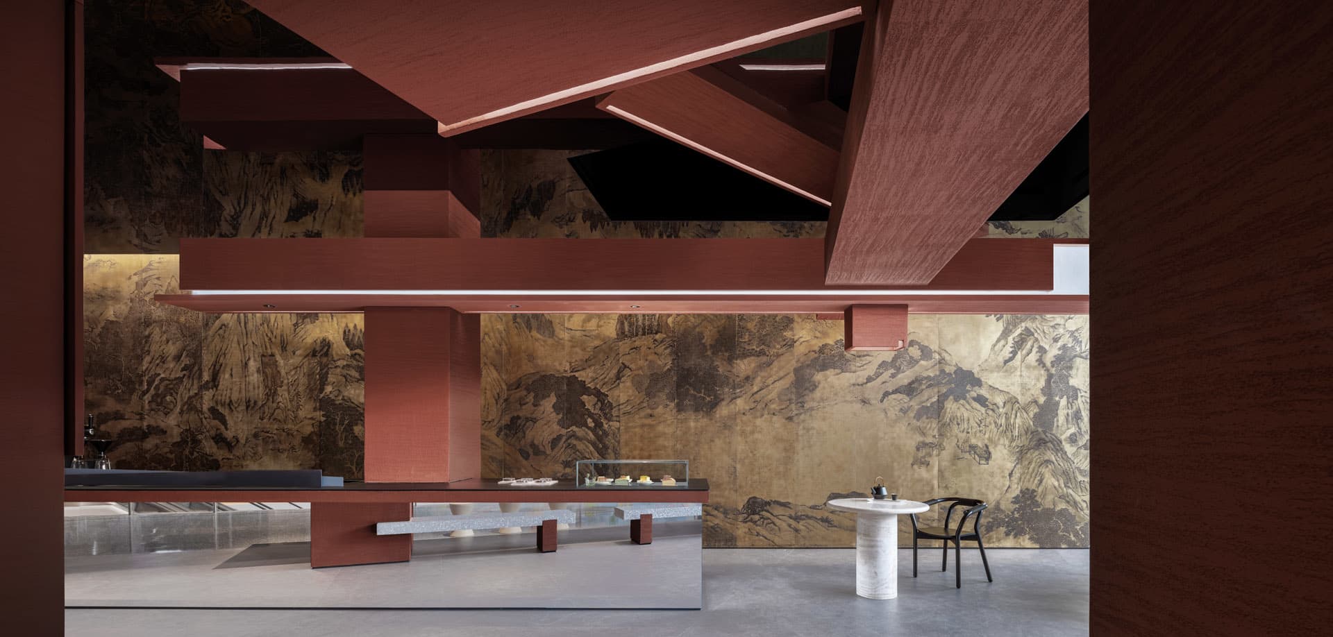 A modern coffee shop with metallic sheet walls and a sleek, minimalist design.