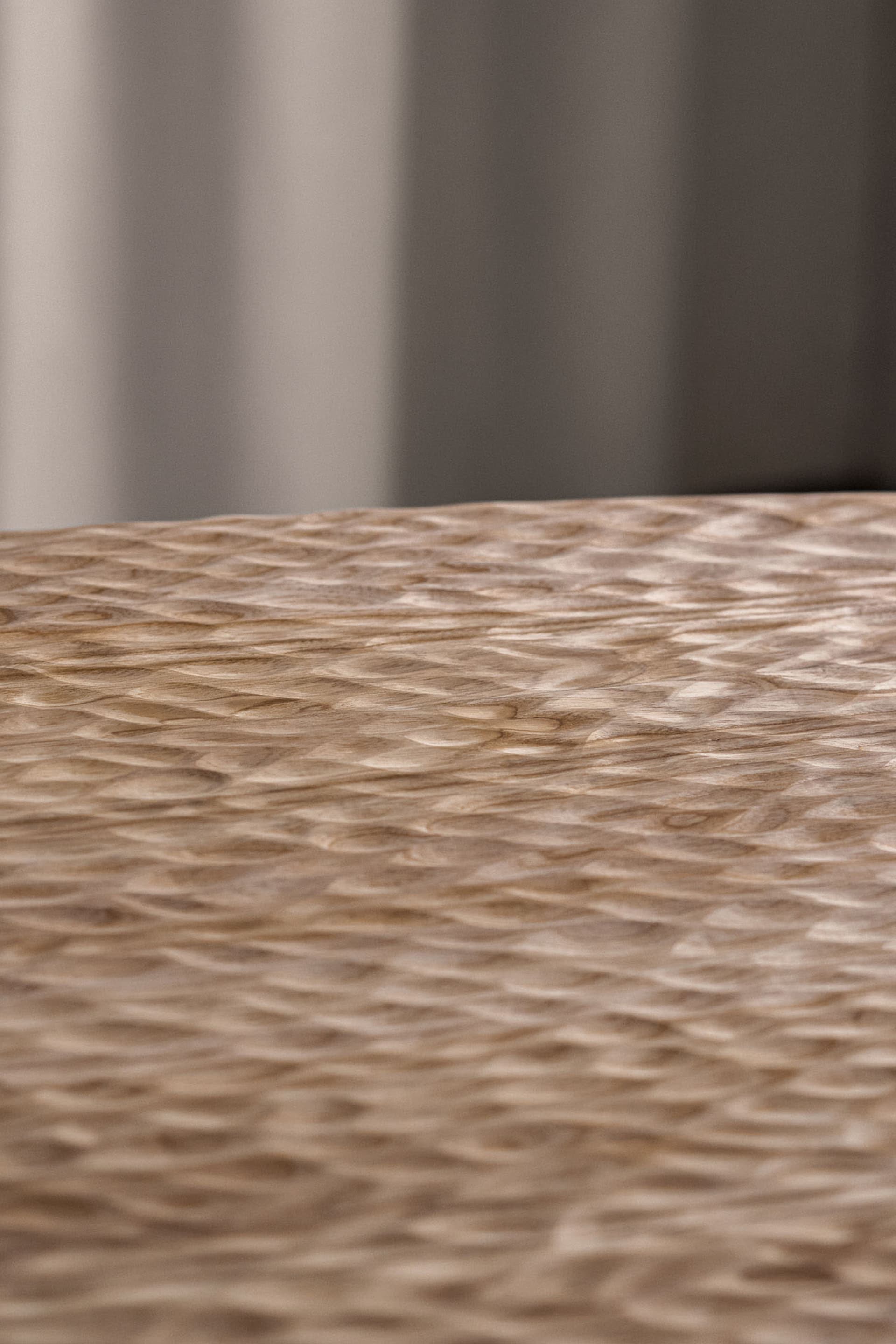 A close-up of a modern laminate texture wood surface