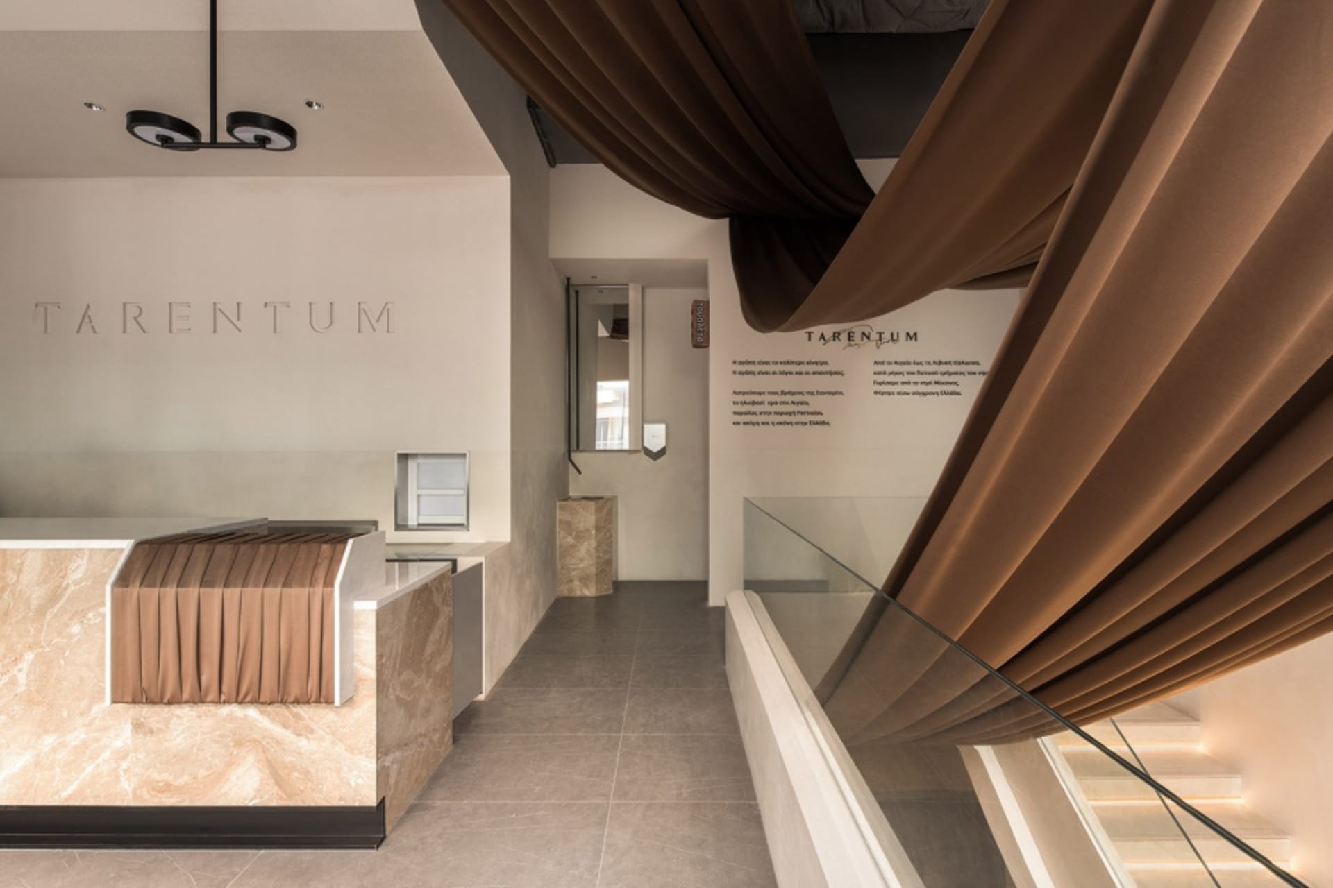 Modern reception desk crafted from marble.