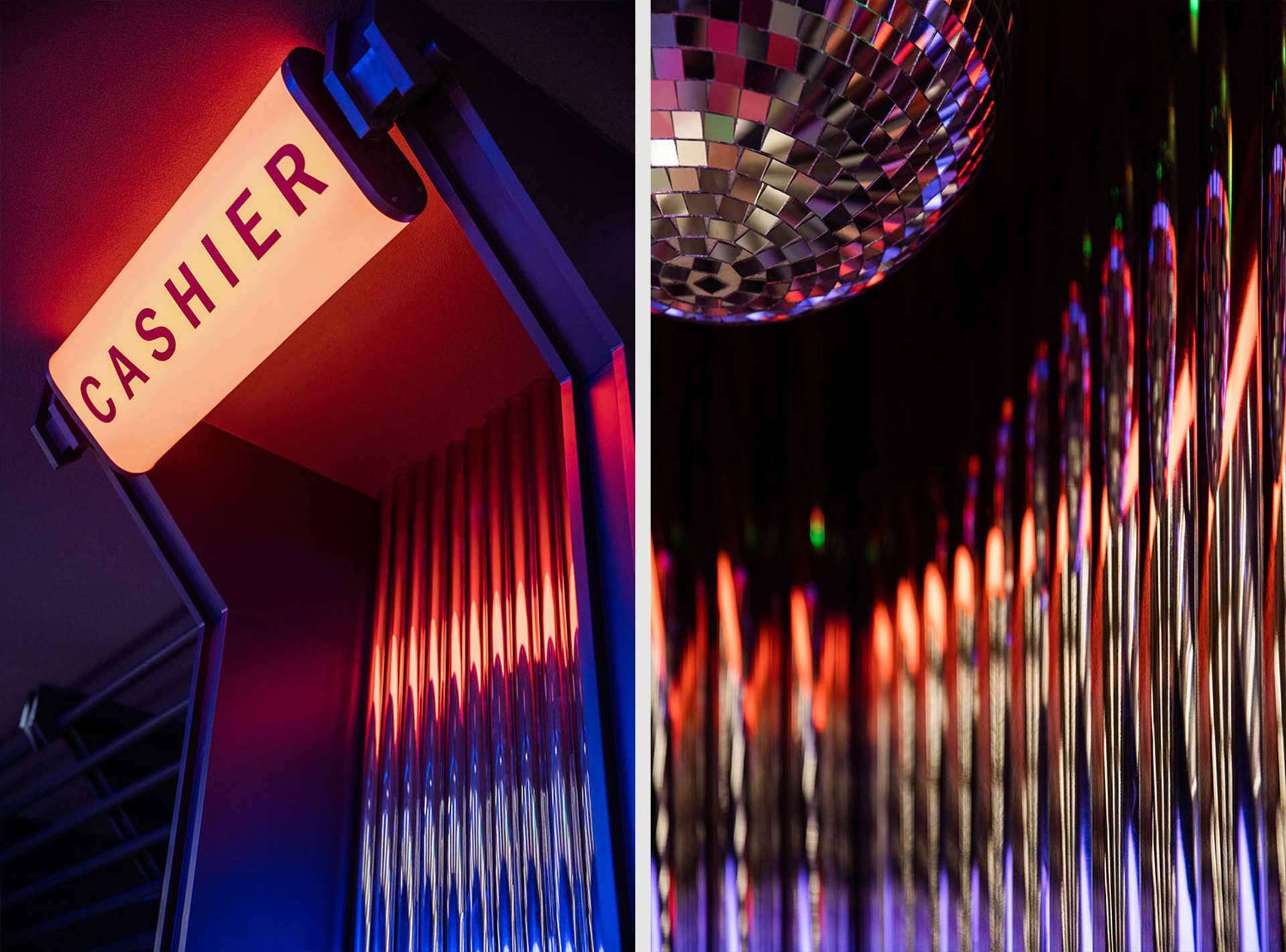 An illuminated 'Cashier' sign mounted on a glass window in a retail setting.