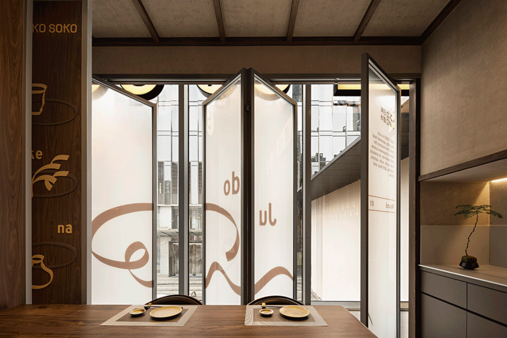 Modern coffee shop with glass folding doors and minimalist decor