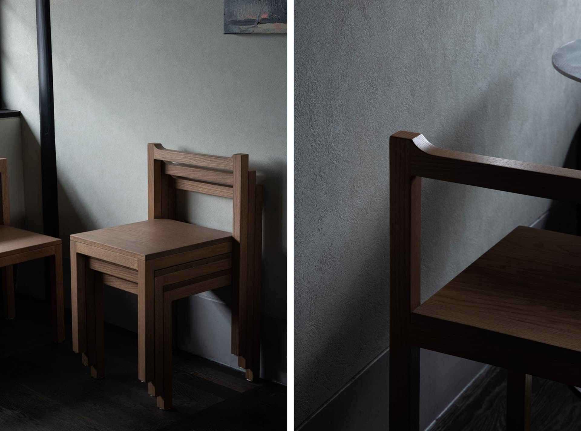Minimalist wooden furniture stack against a textured gray wall, showcasing clean lines and natural materials.