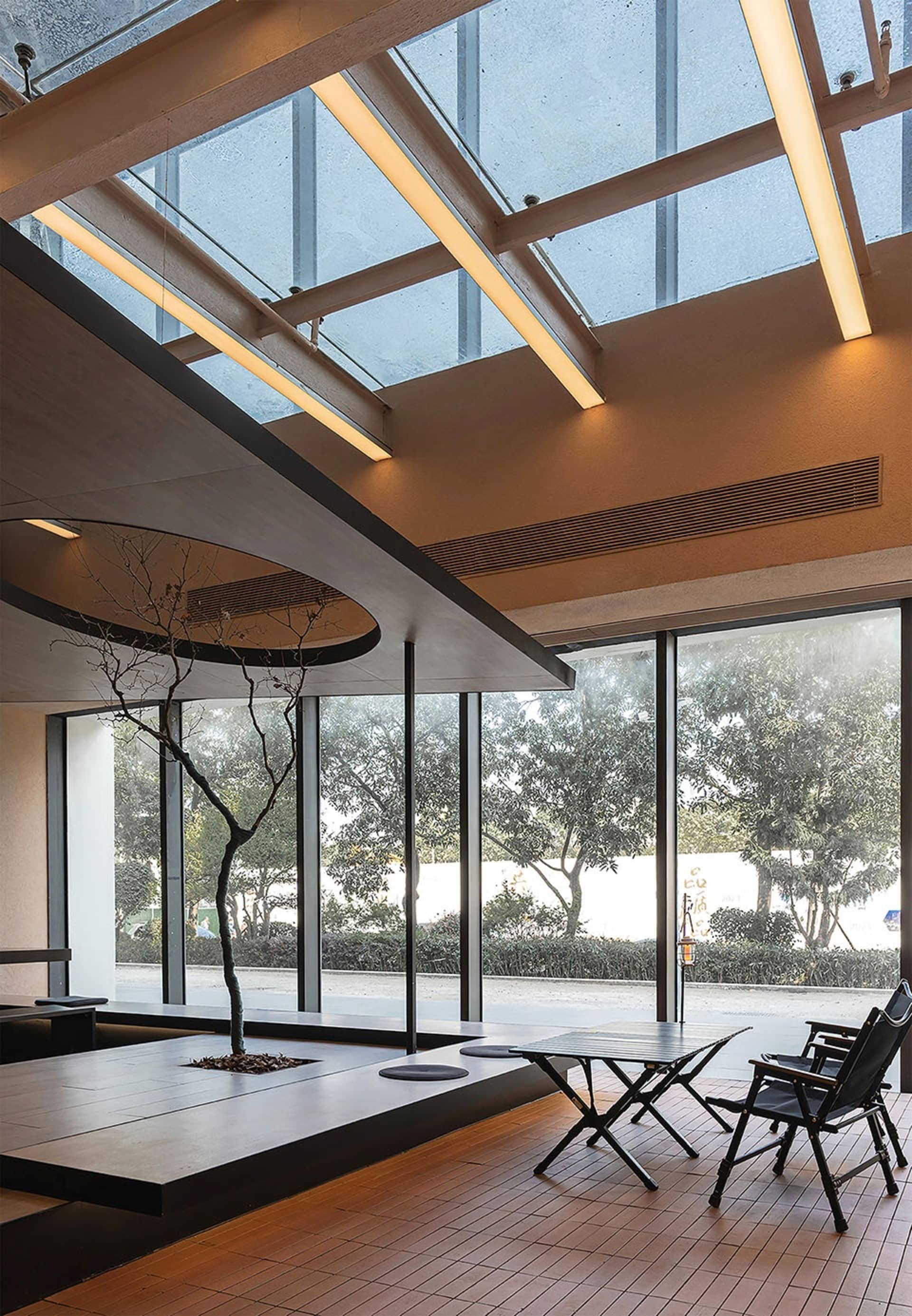 A modern home interior featuring wood and glass materials.