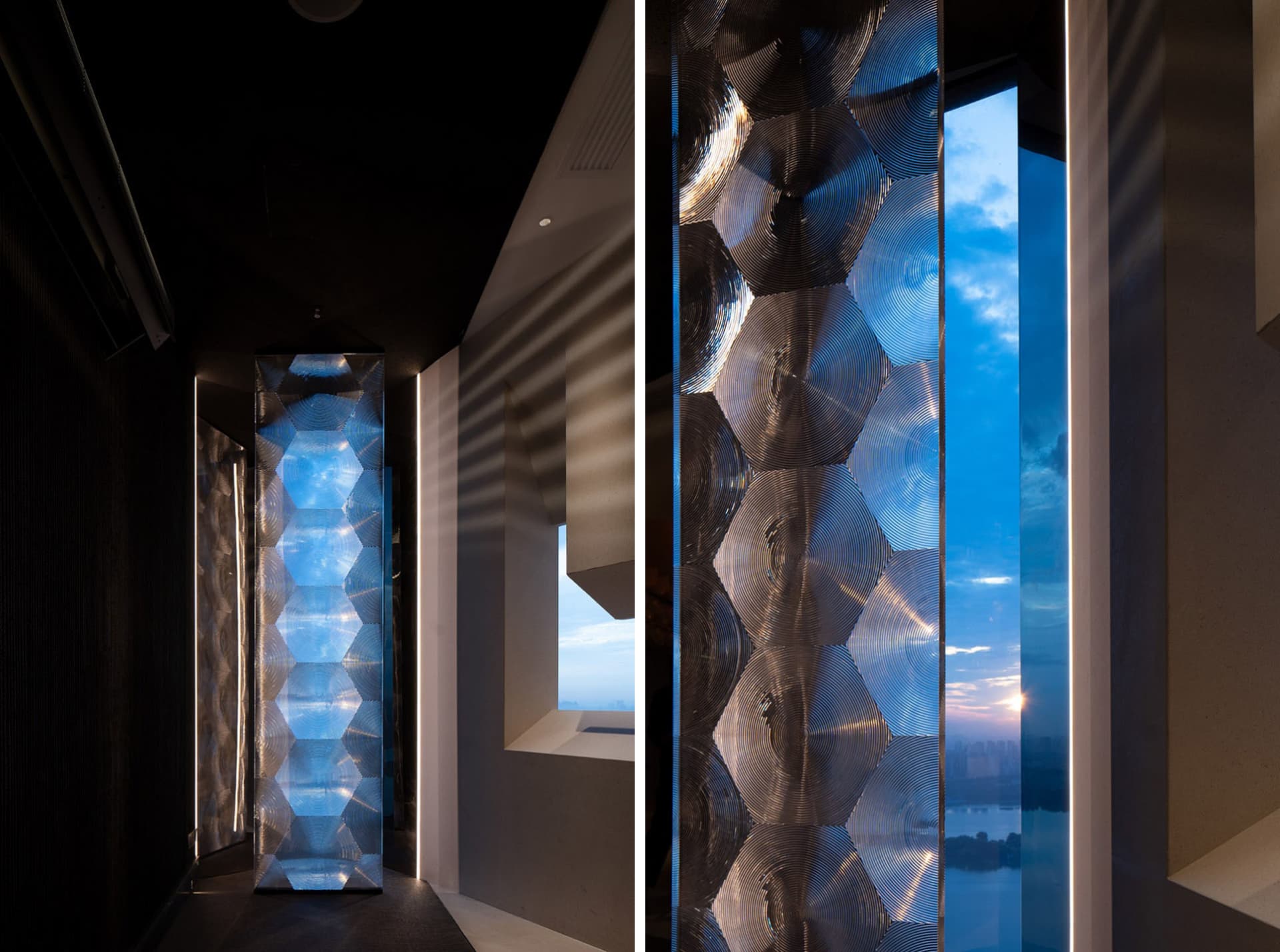 Modern office space featuring glass columns with reflective surfaces