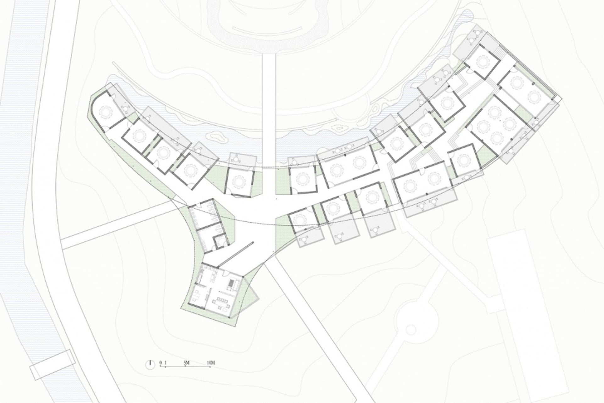 住宅建築的平面圖,置於白色背景的紙張上,帶有格線。