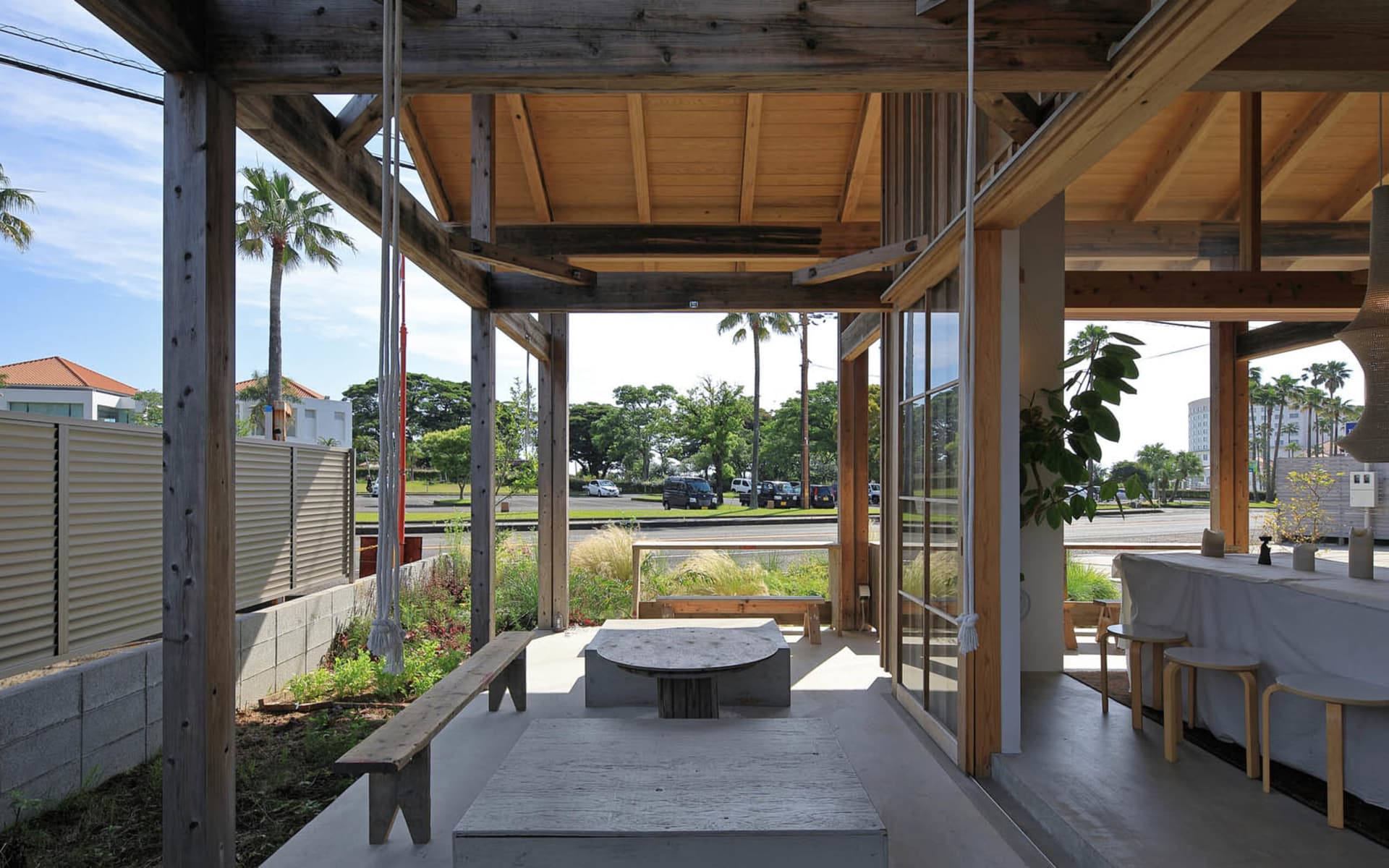 Modern interior design featuring cafe-bar space with conditioned wooden materials.
