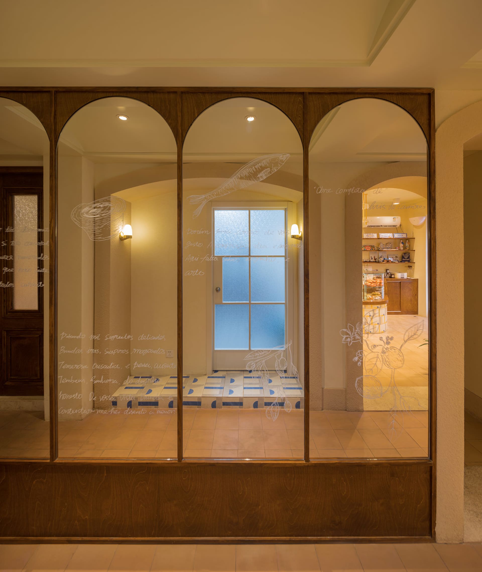 A modern retail storefront with a glass door.