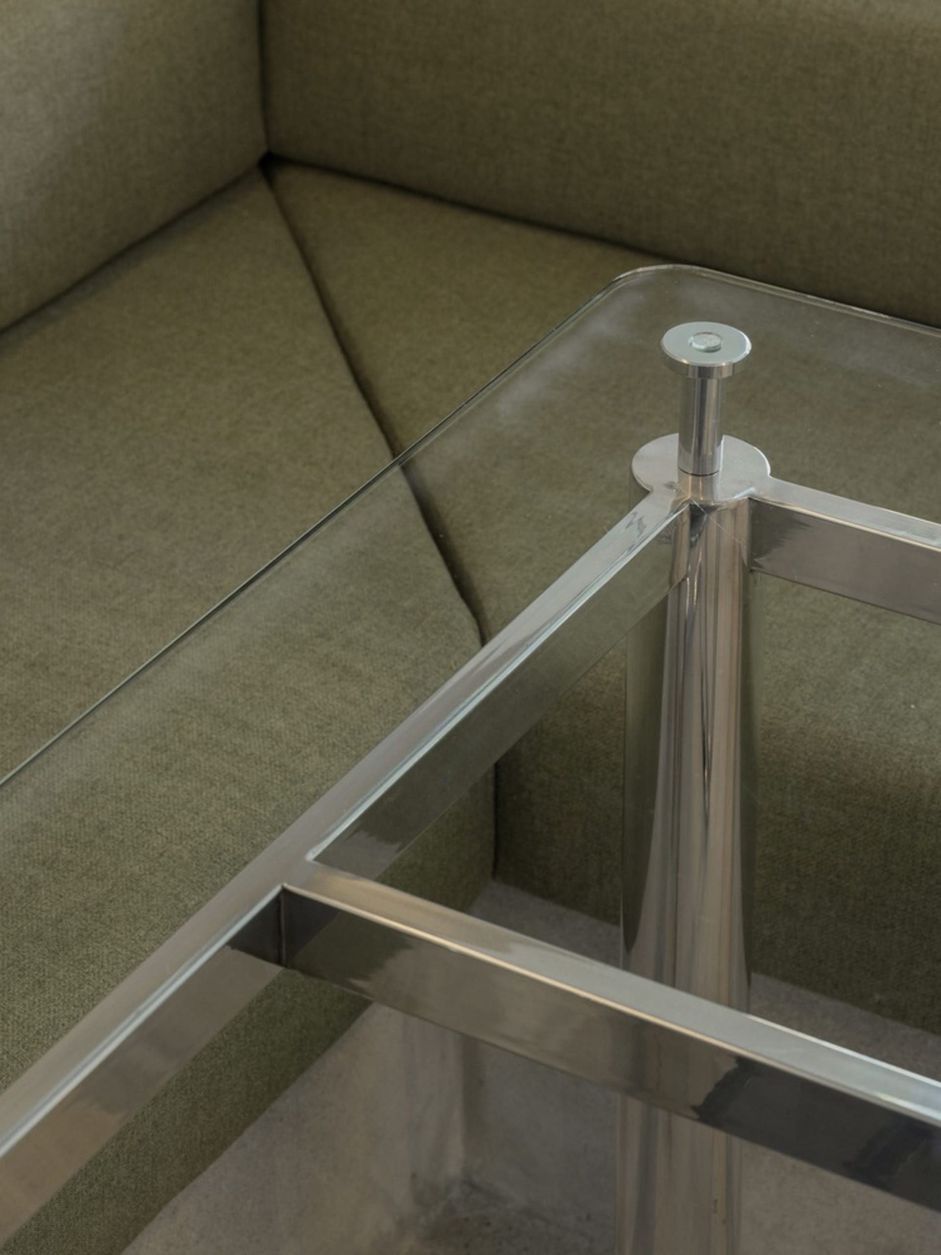 Glass and stainless steel modern interior design, featuring minimalist aesthetics and contemporary furniture.