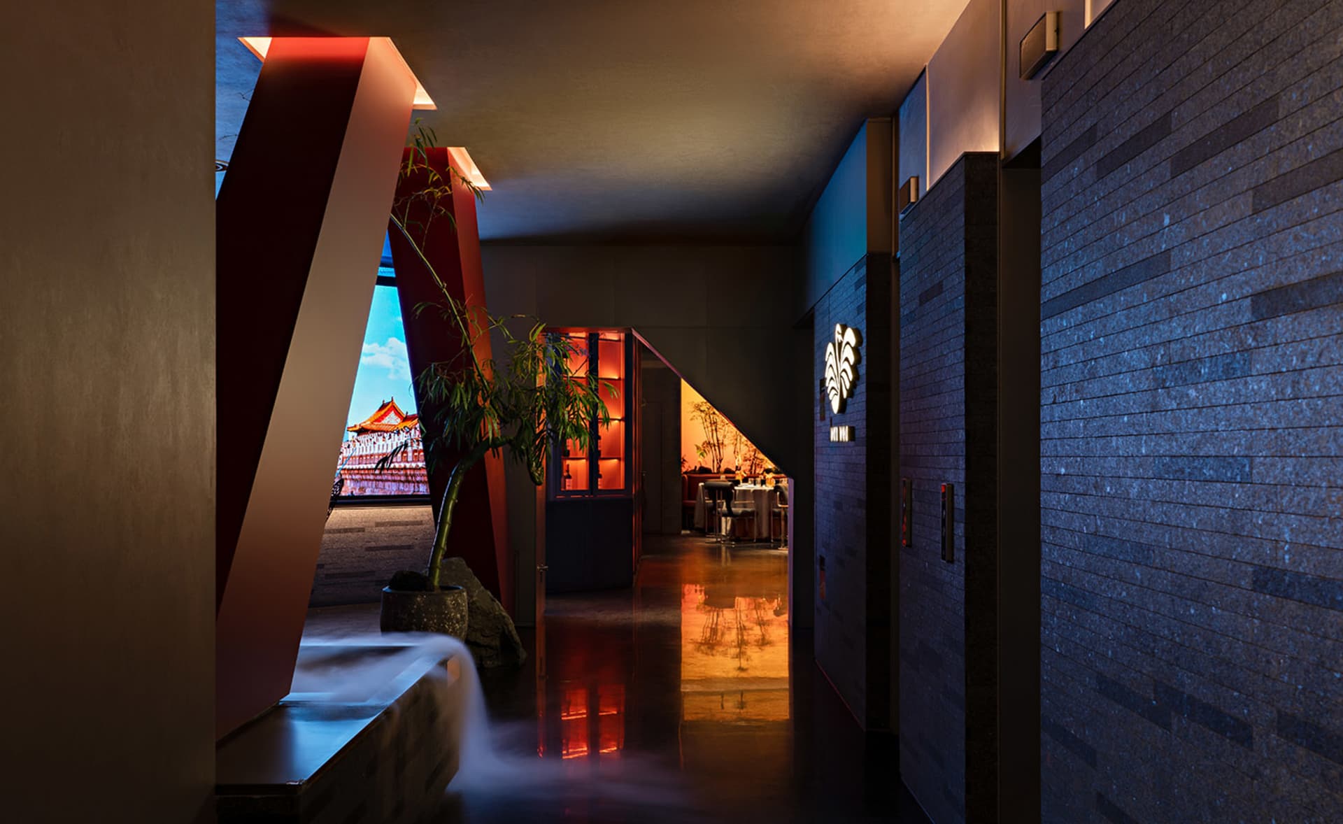 A modern hospitality interior with glass elements and contemporary design.
