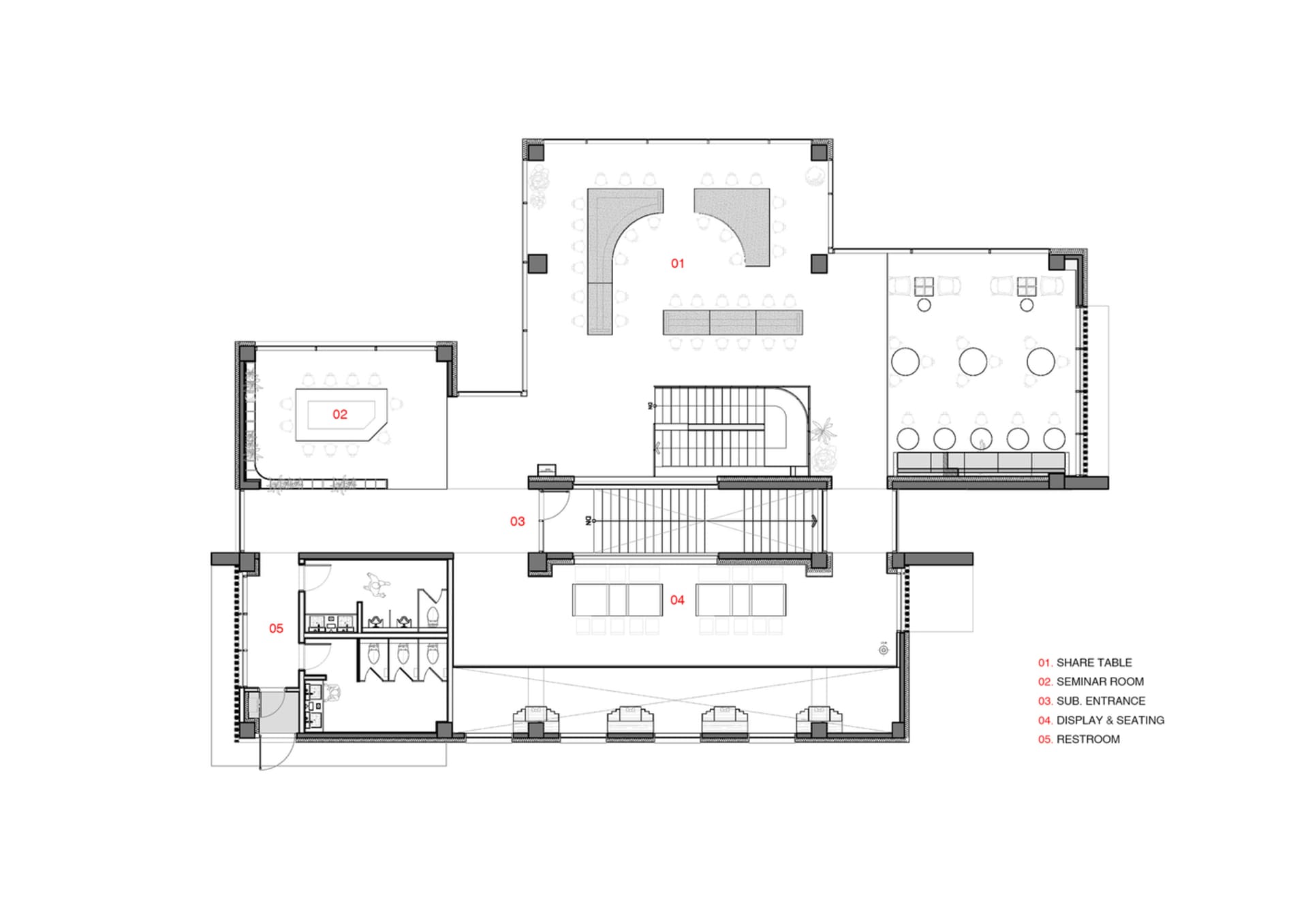 An industrial office space with concrete, steel, and glass materials, featuring a central share table, seminar room, display