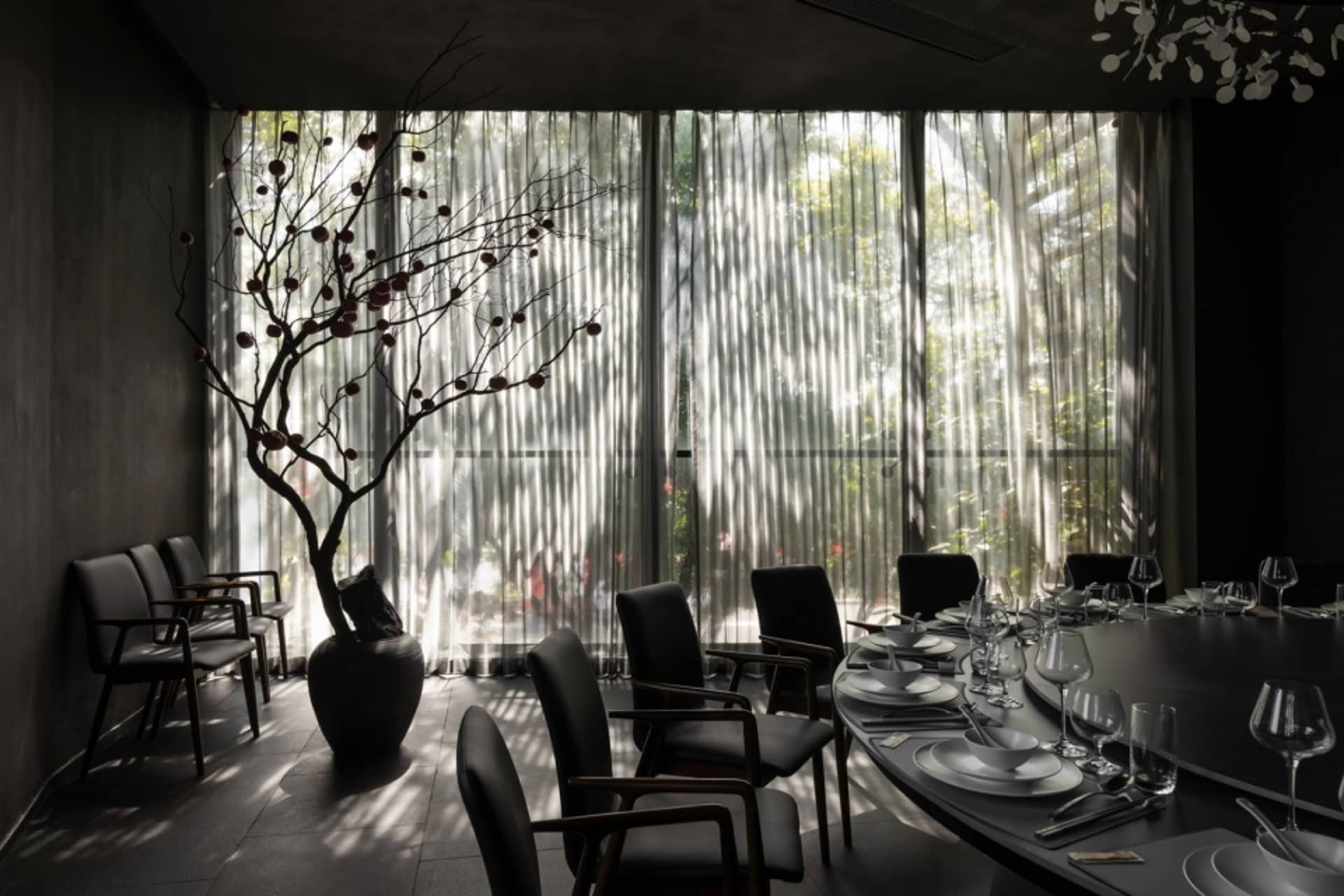 Modern dining room with glass curtains and minimalist design