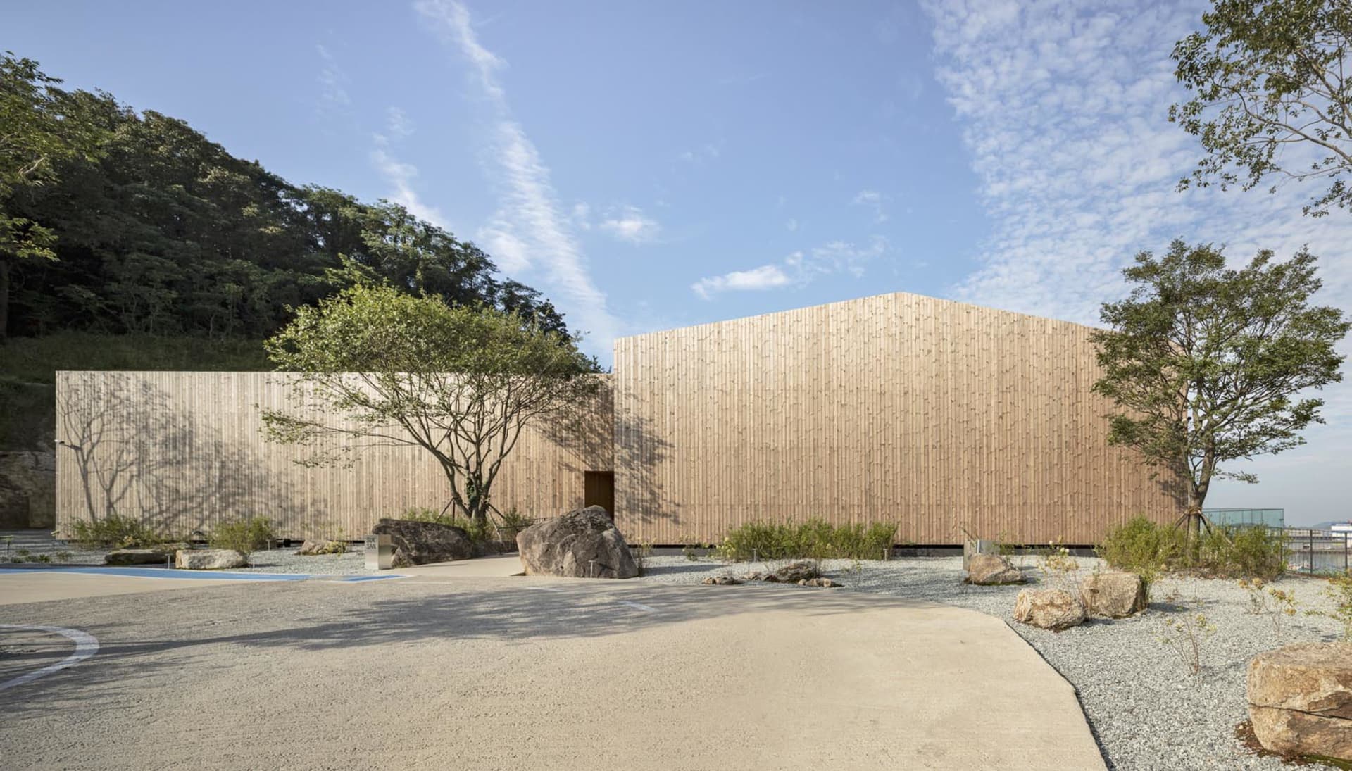A modern office building with a wooden facade.