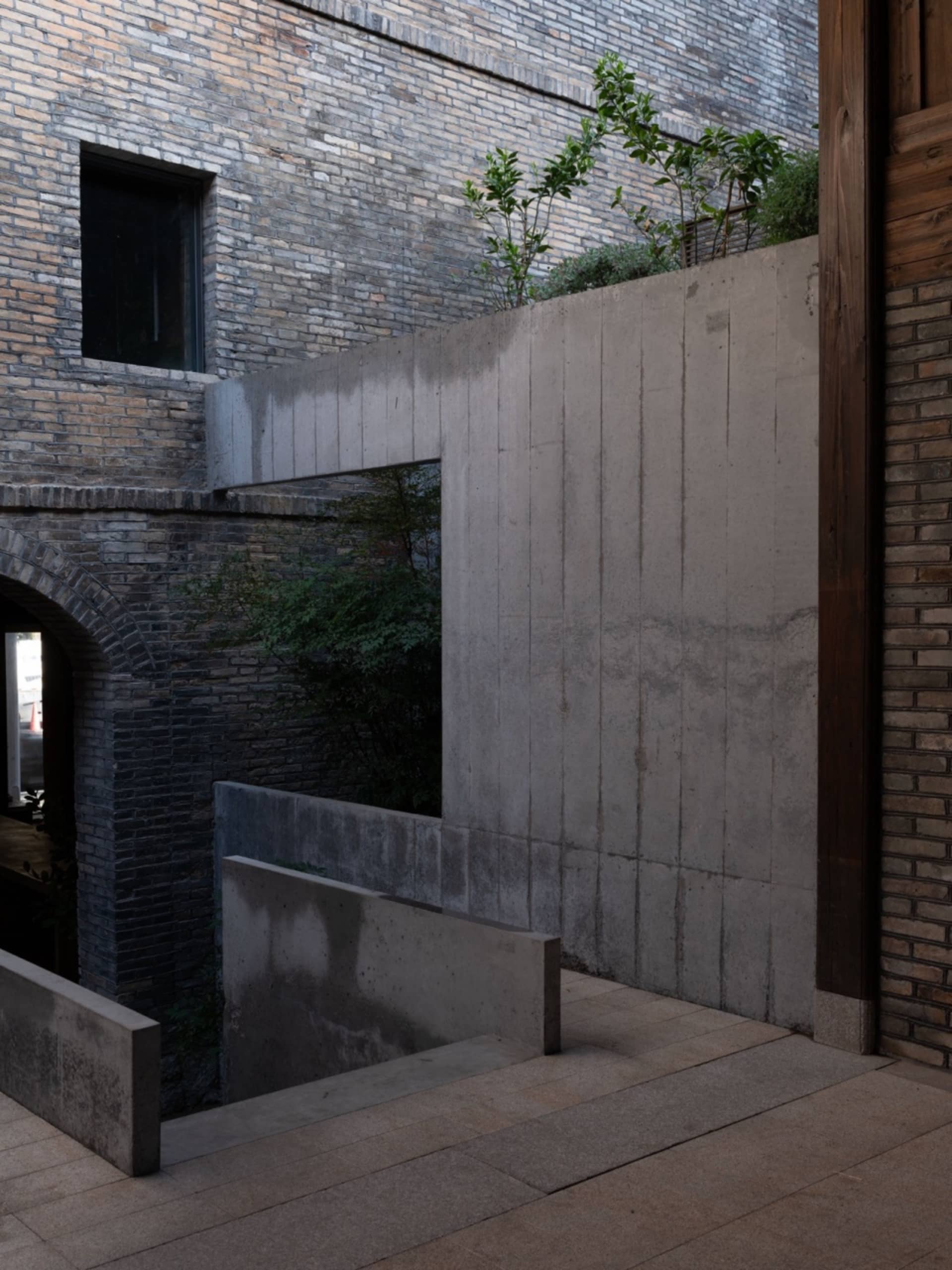 Concrete brick architectural entrance with a minimalist design