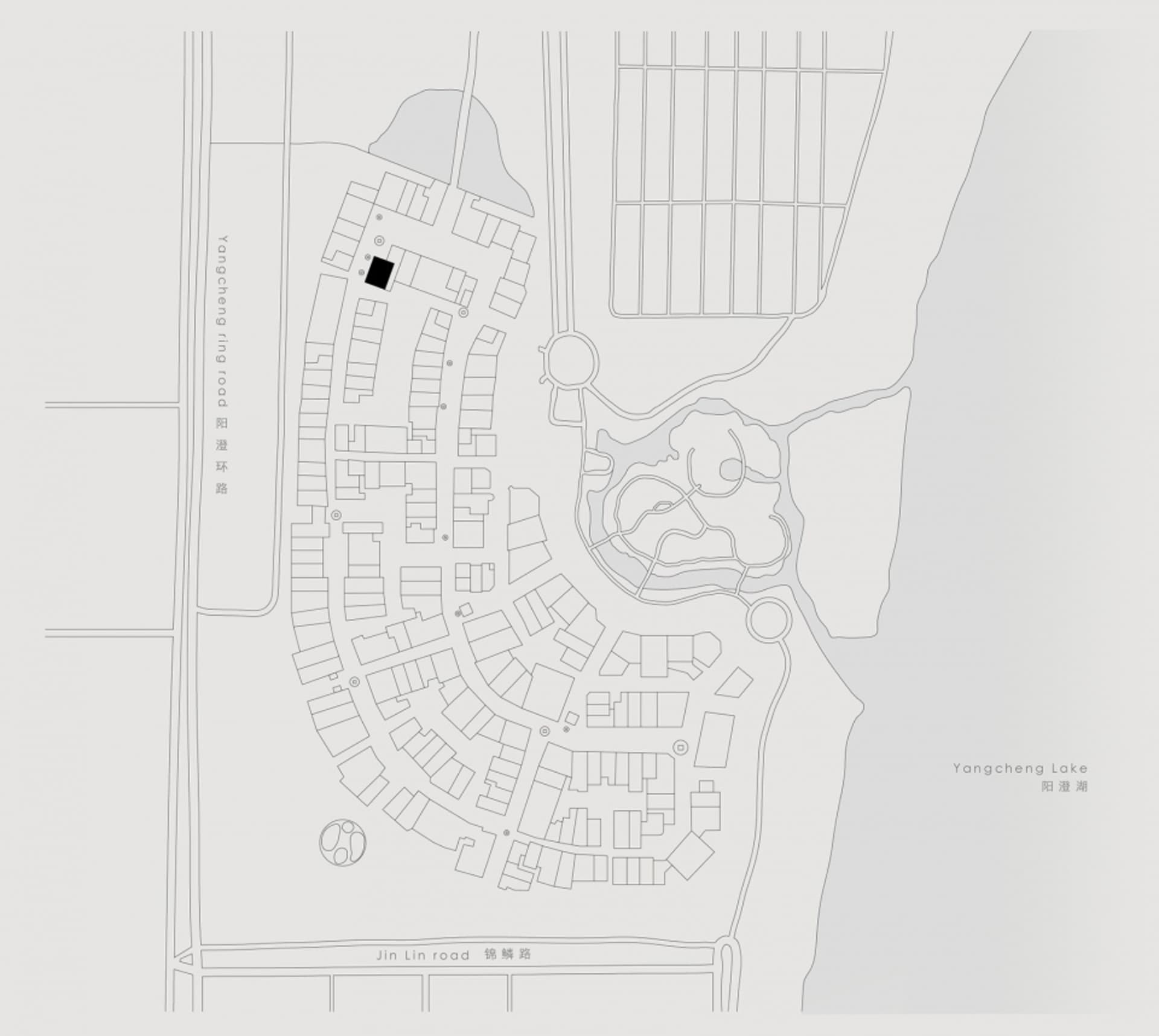 A detailed site plan of a residential development, including roadways and buildings.