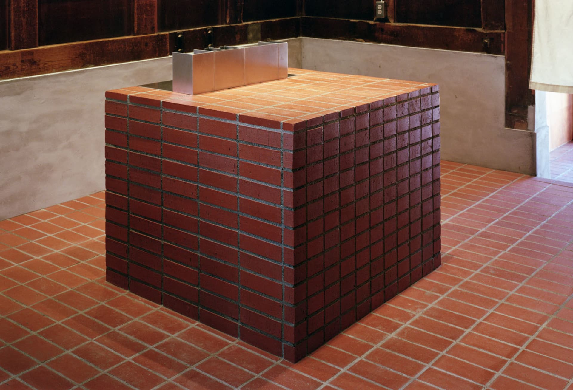 A large, industrial installation made of brick tile.