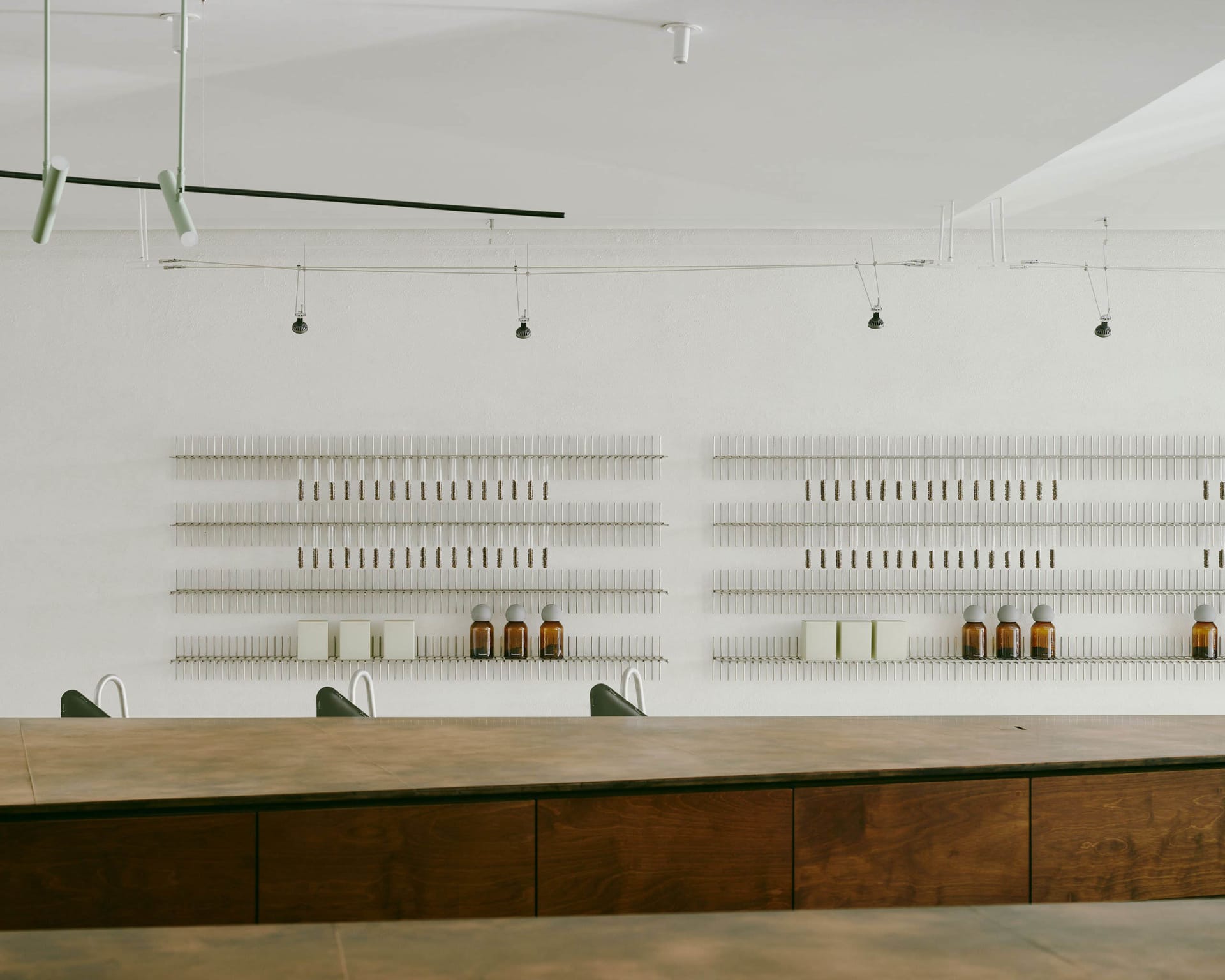 Modern restaurant interior with wooden tables and concrete walls