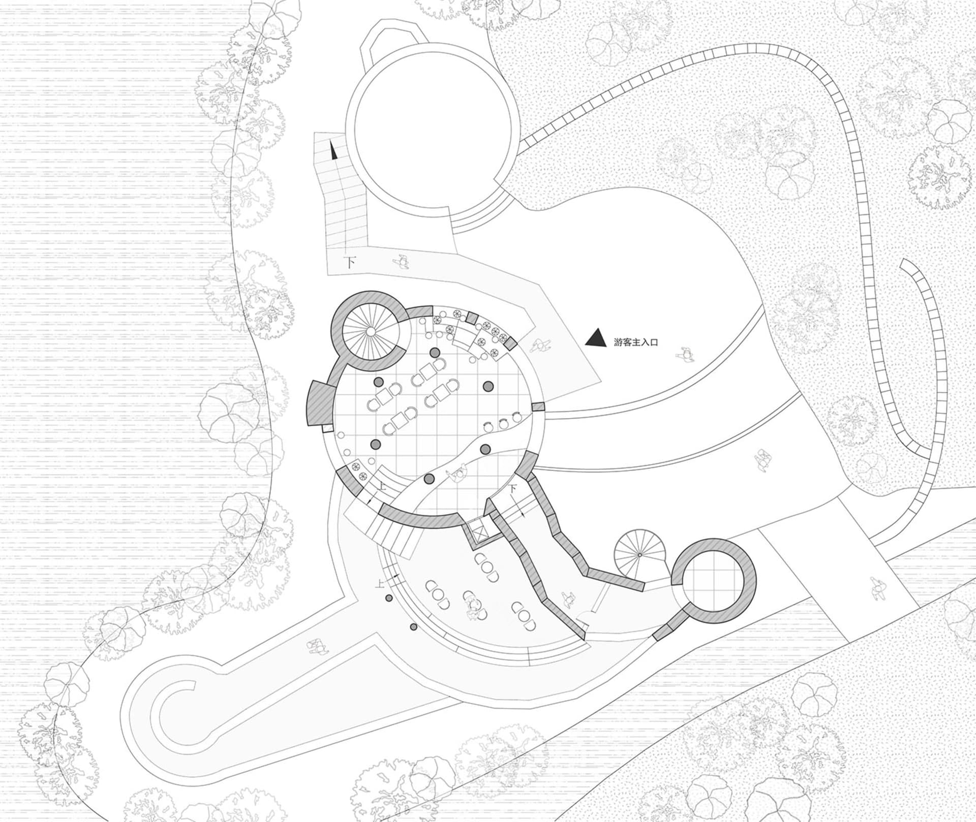 Architectural floor plan of an outdoor area with various functional zones and pathways.