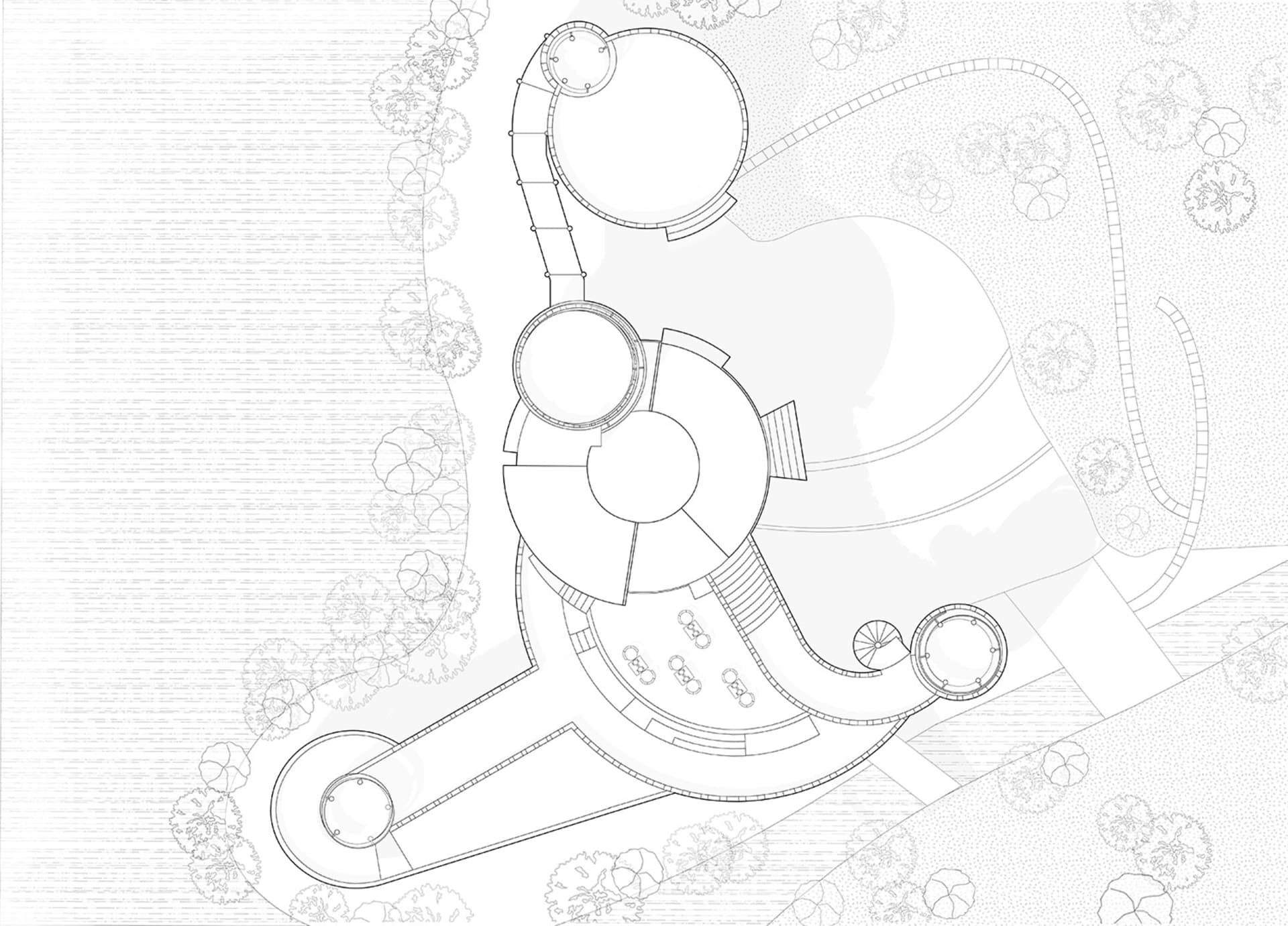 A detailed architectural and landscape plan depicted on a paper sheet.