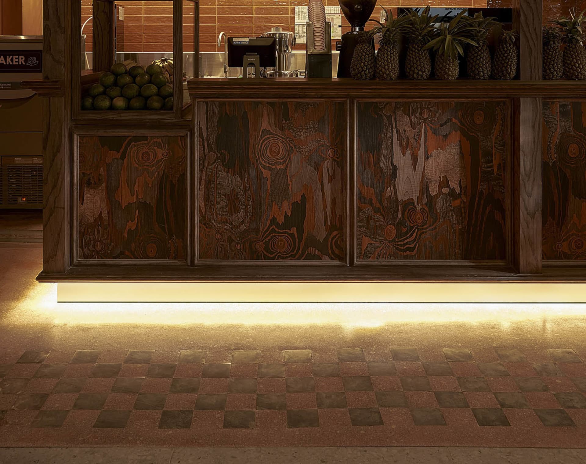 Pineapple-top wooden coffee shop counter with illuminated led strip