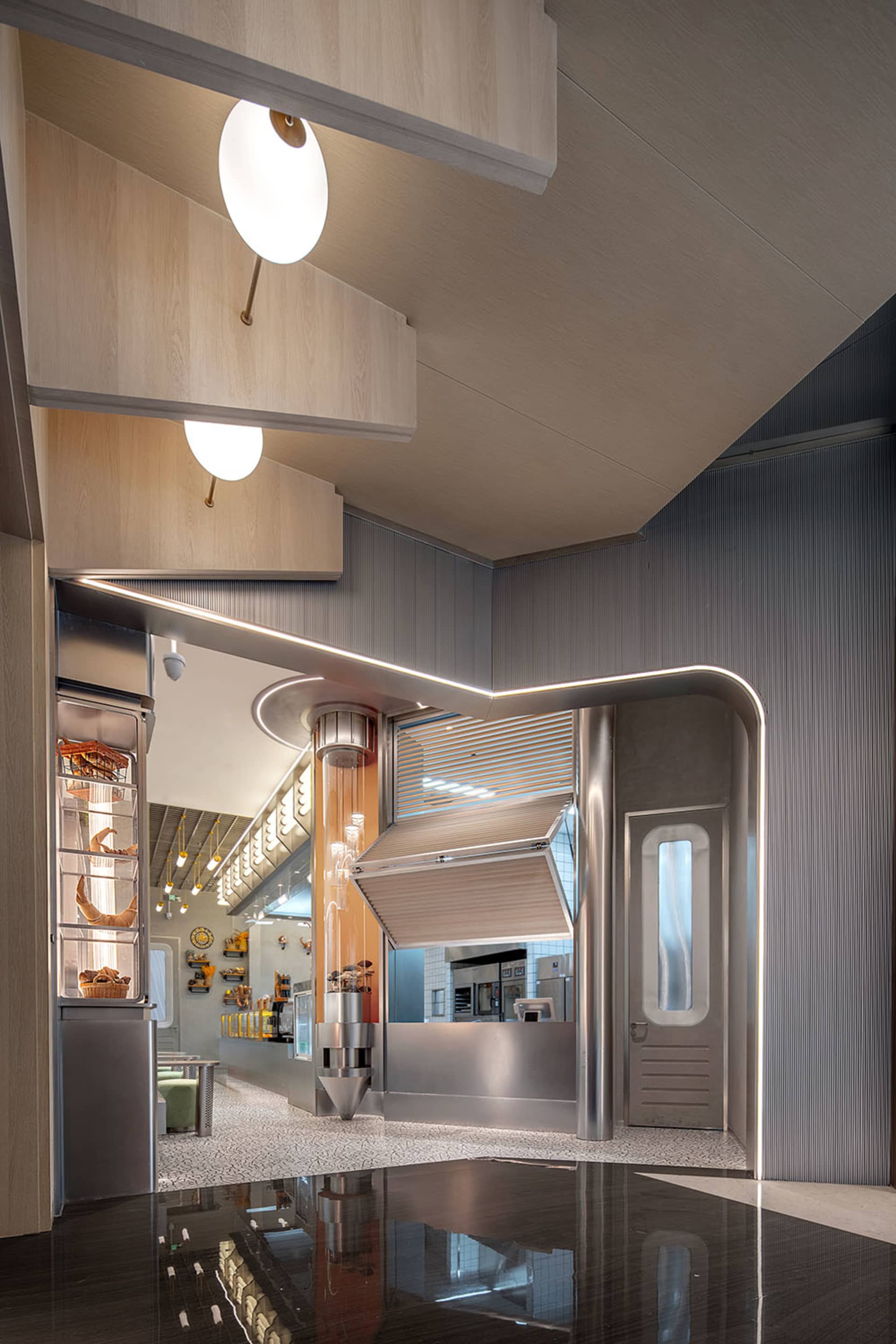 Metallic commercial space interior with modern design elements.