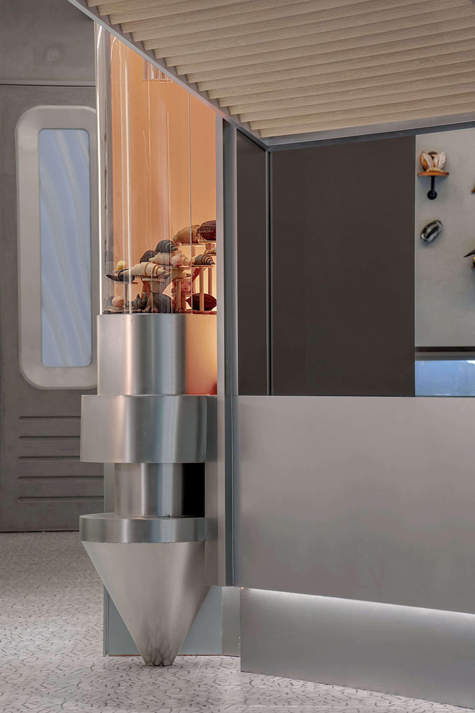 A modern retail store featuring a sleek metal counter.