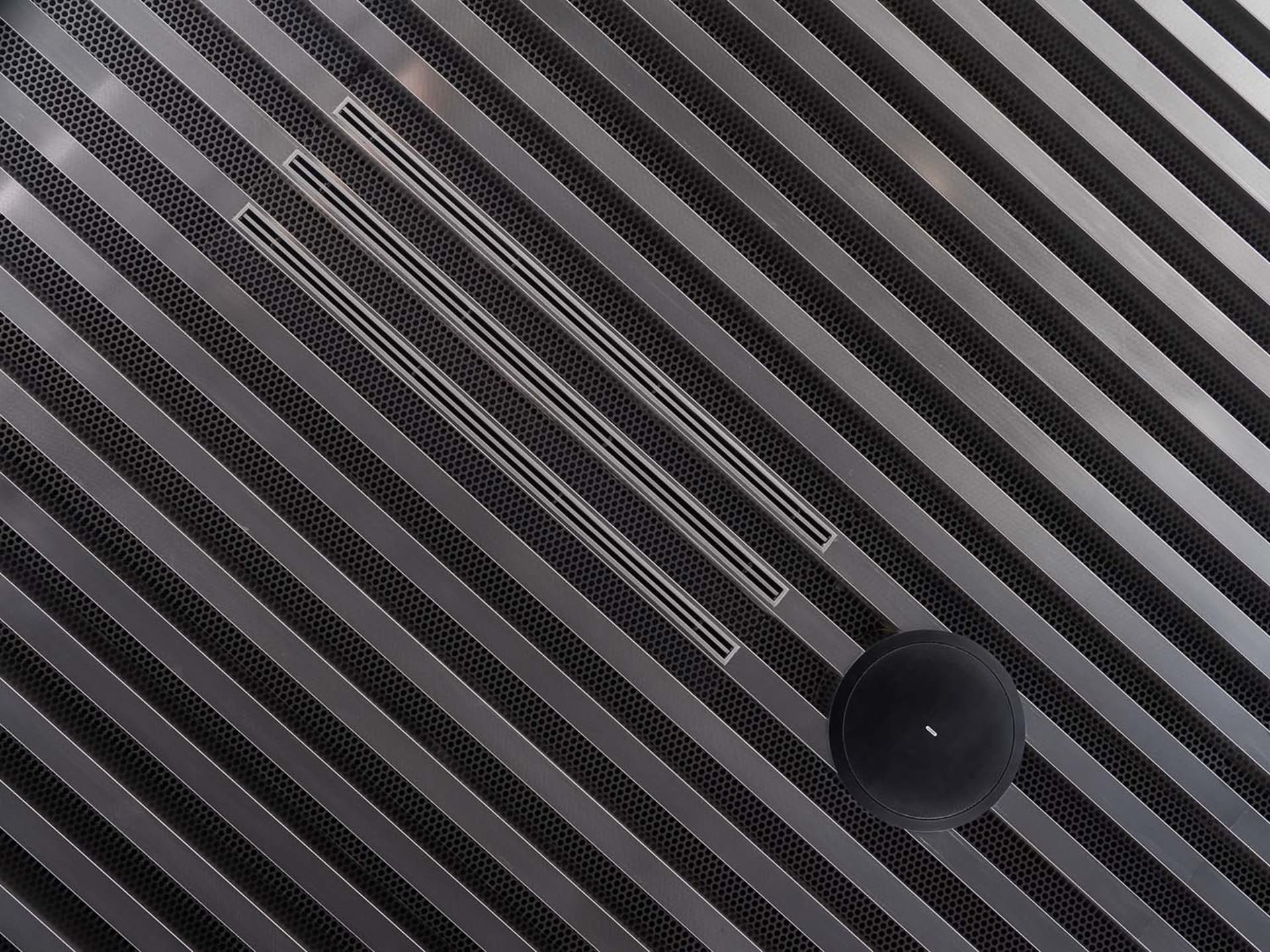 A metal floor plan with linear design elements.