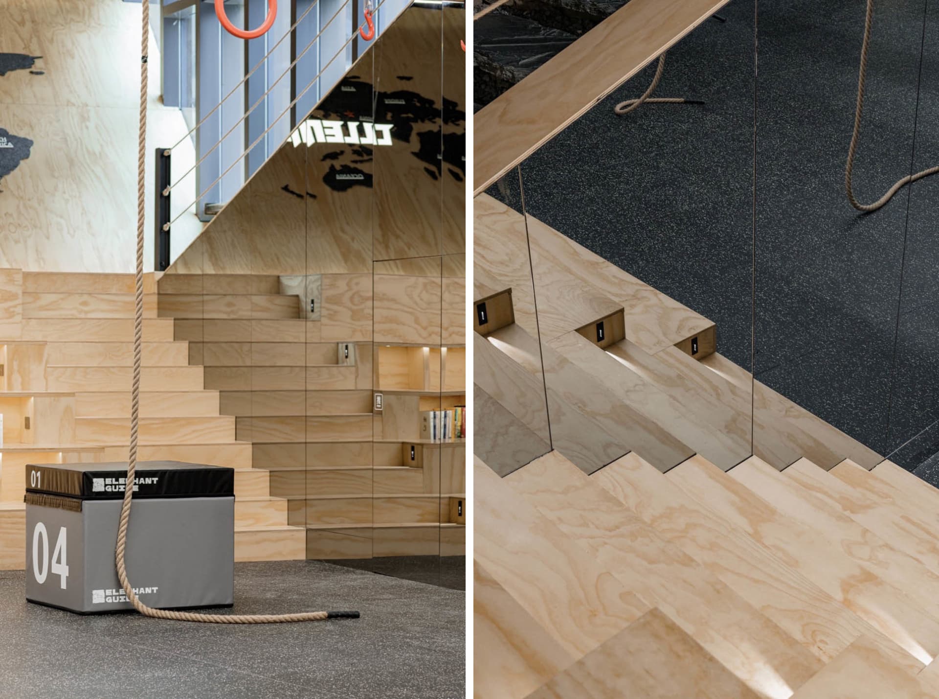 Modern industrial-style fitness center with wooden stairs and a rope climbing apparatus
