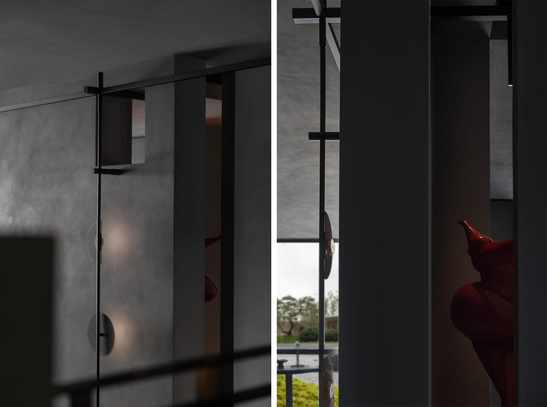Modern interior design featuring glass panels and architectural columns.