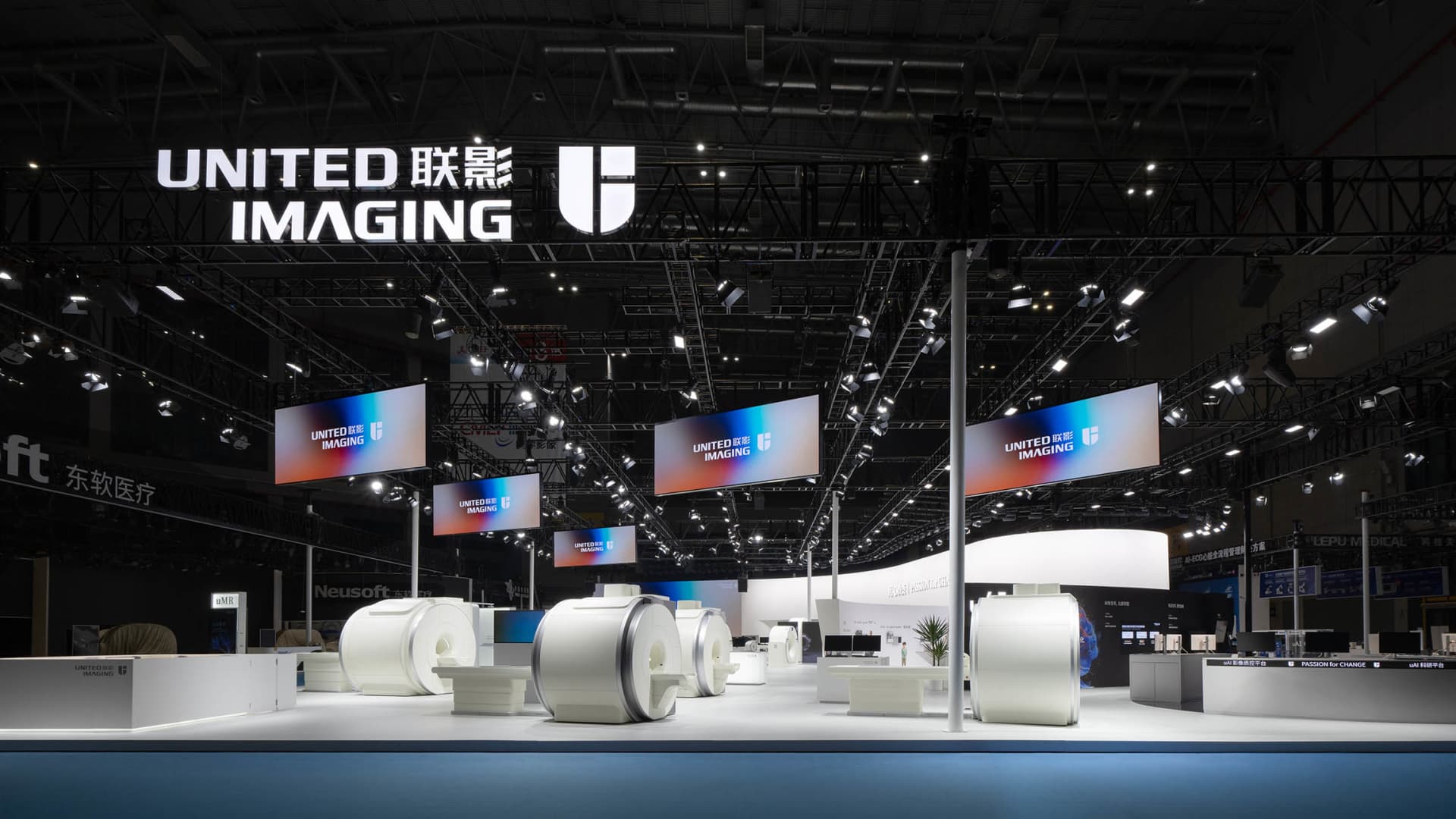 A large industrial technology exhibition showcasing advanced imaging equipment.