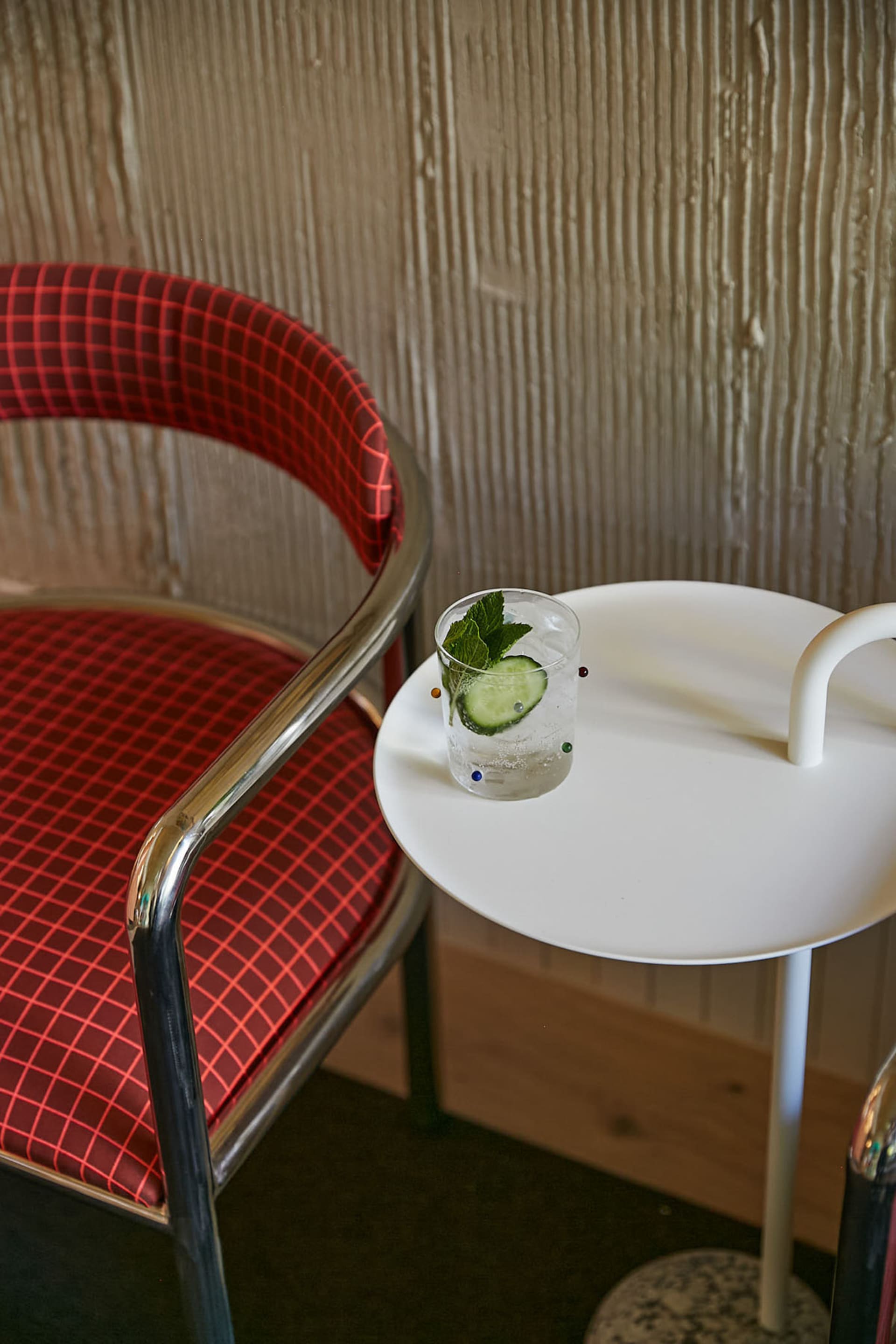 Modern interior of a restaurant featuring a glass cocktail.