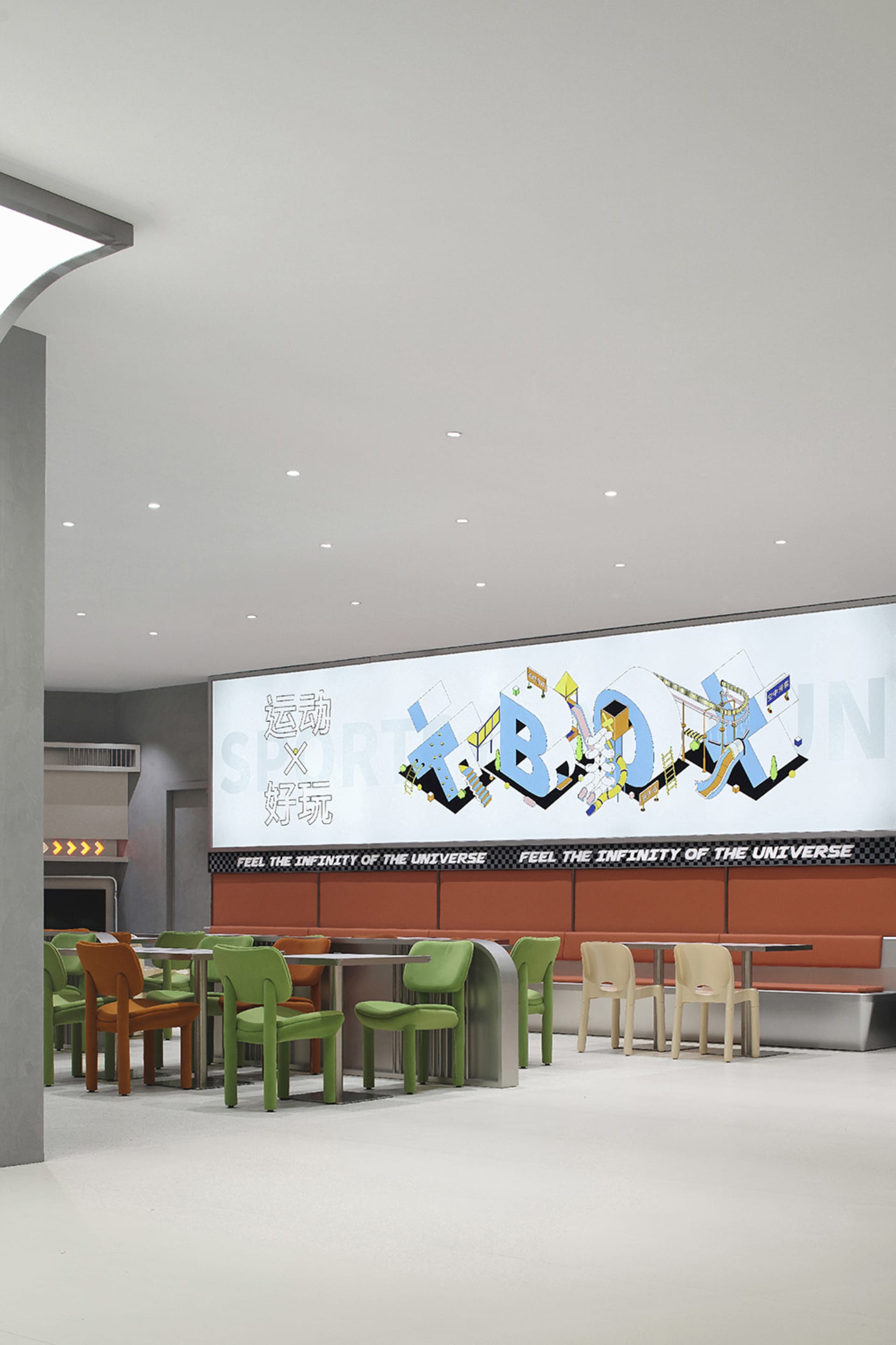 Contemporary food court with modern furniture, white floor, and concrete seating.