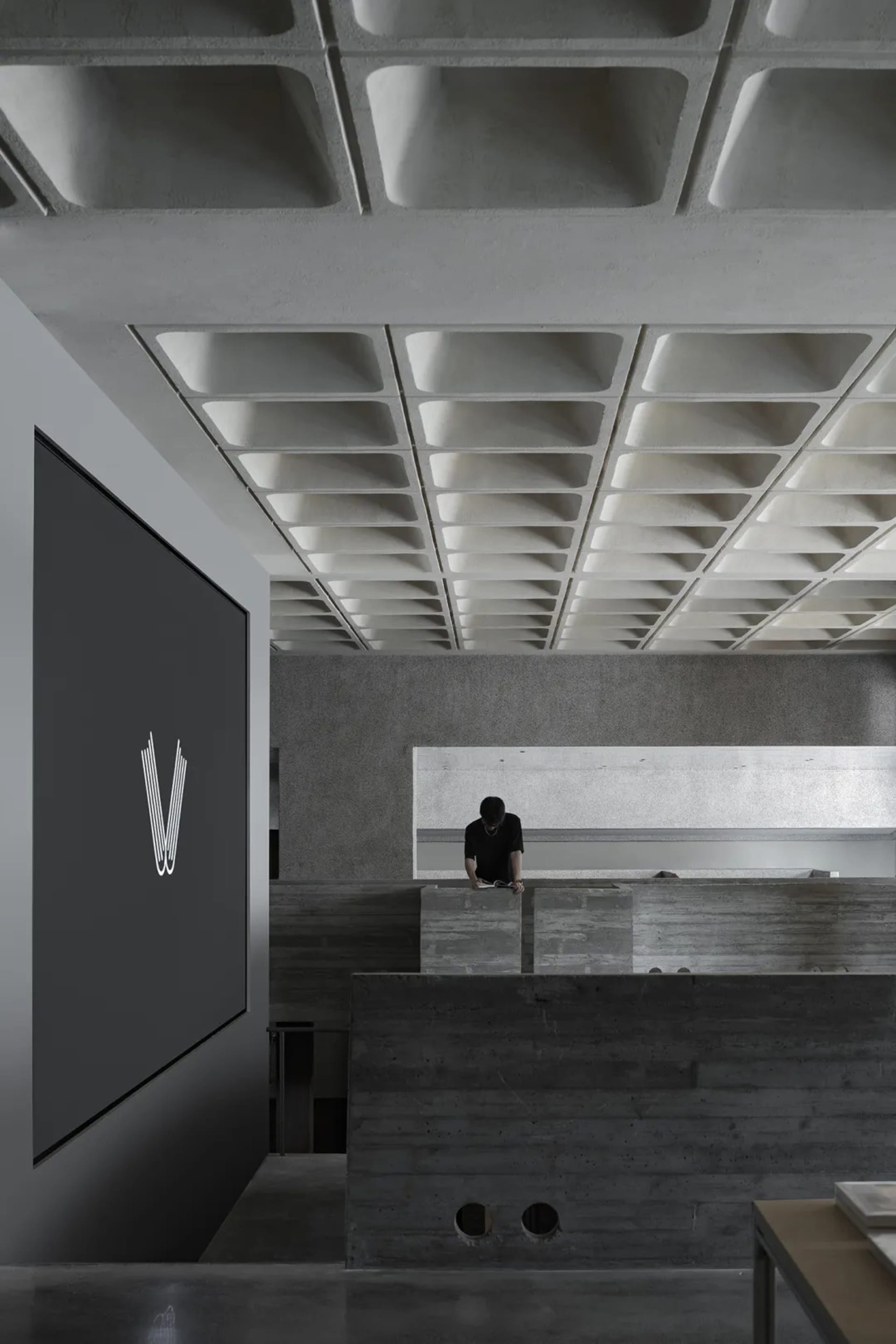 Modern interior design featuring concrete materials and minimalist aesthetic