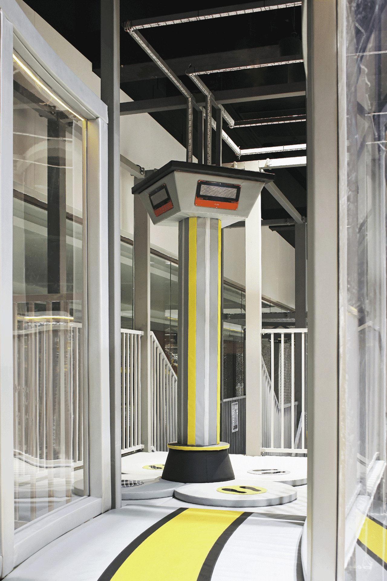 Industrial design featuring glass and metal materials.