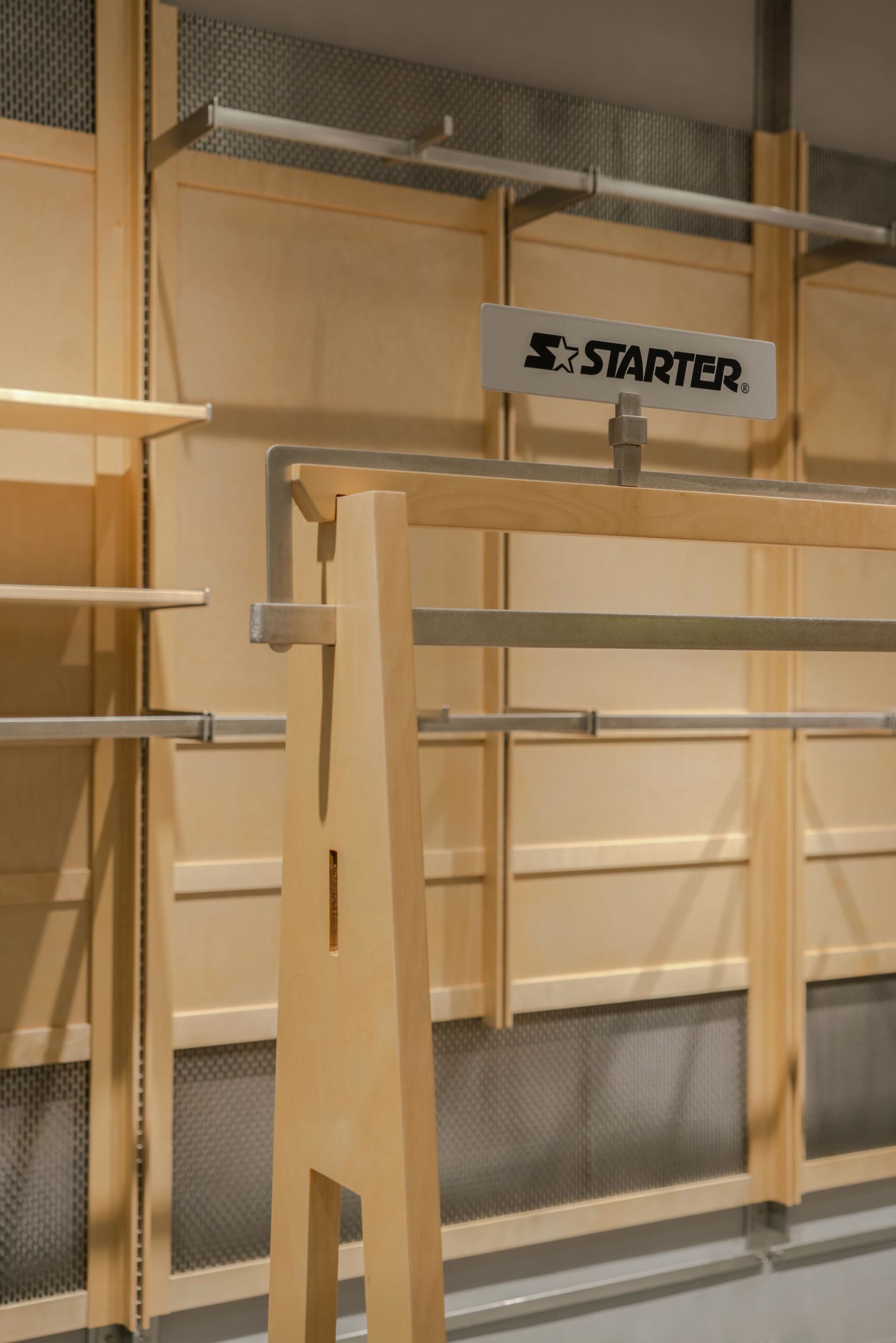 Clothing rack with metal and wooden parts