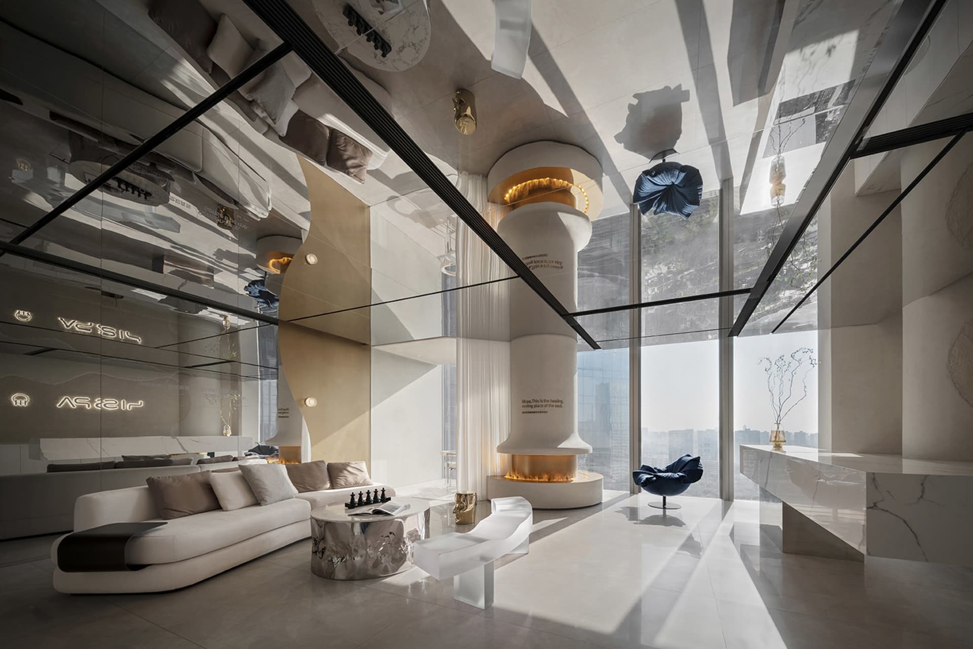 Modern living room featuring marble and glass elements.