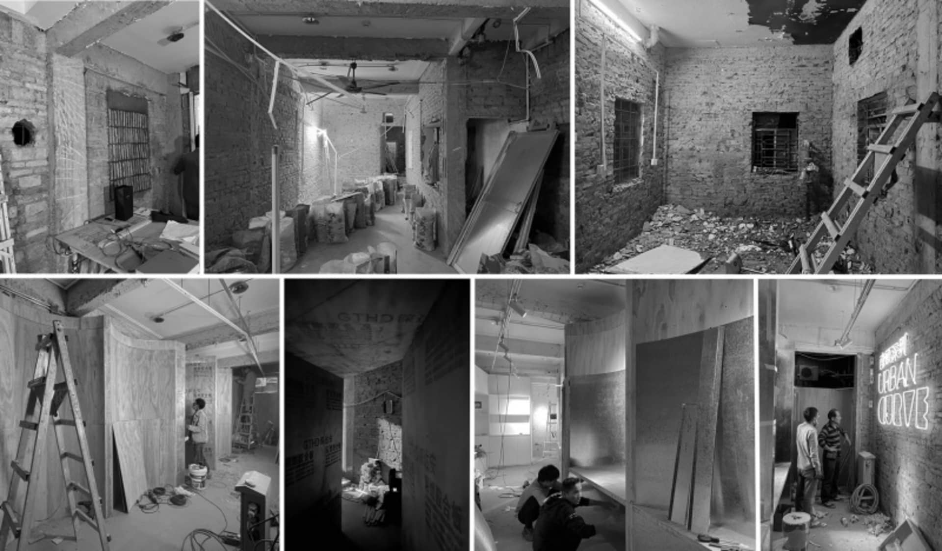 Construction site featuring exposed brick walls during a remodel process.