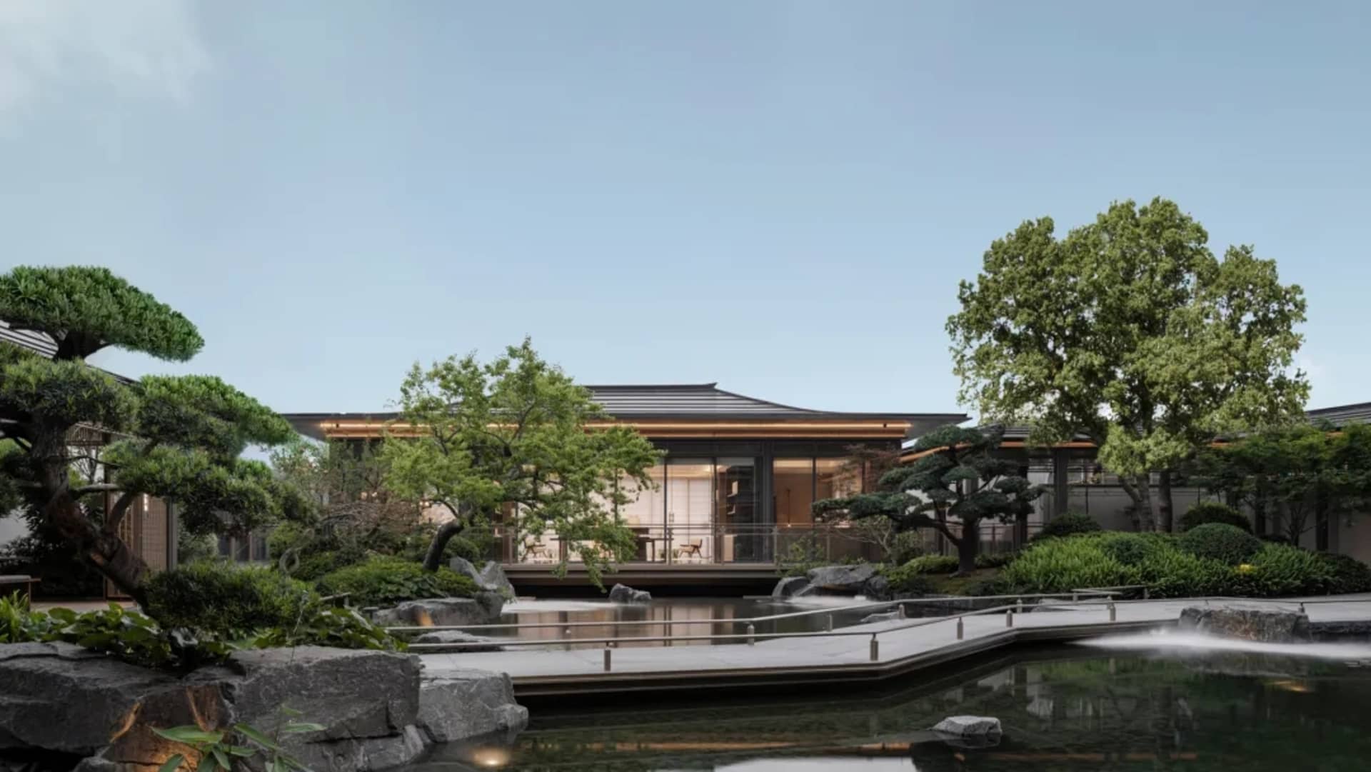 現代住宅花園採用混凝土與玻璃材質，並設有寧靜水景。