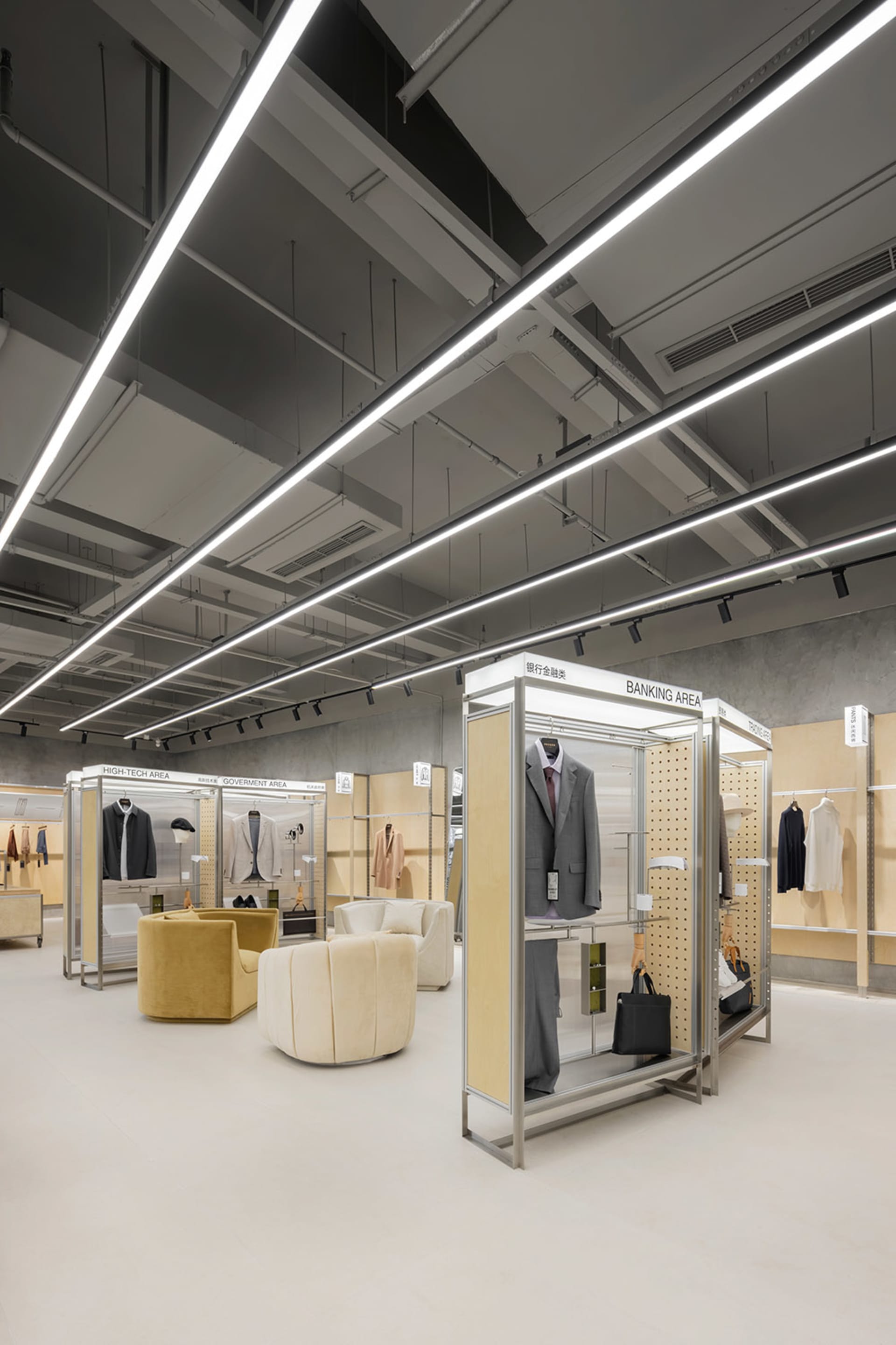 Interior design of a modern retail shop featuring metal, glass, and wood elements.