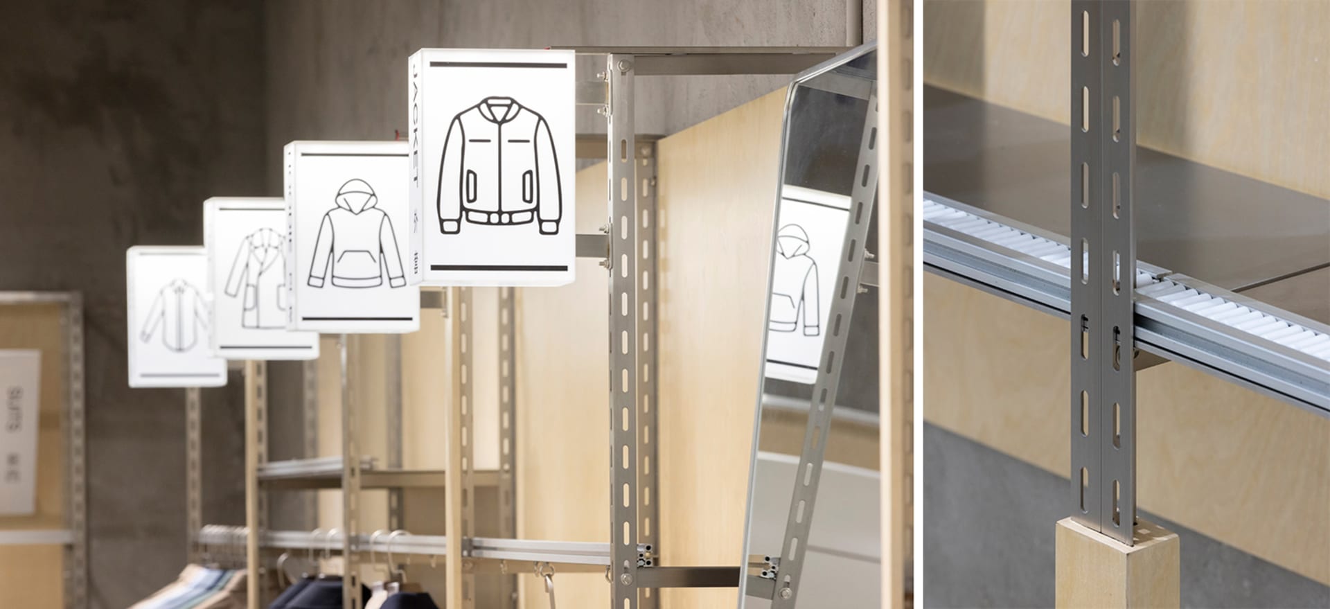 Modern retail storefront with metal labels displaying clothing images.