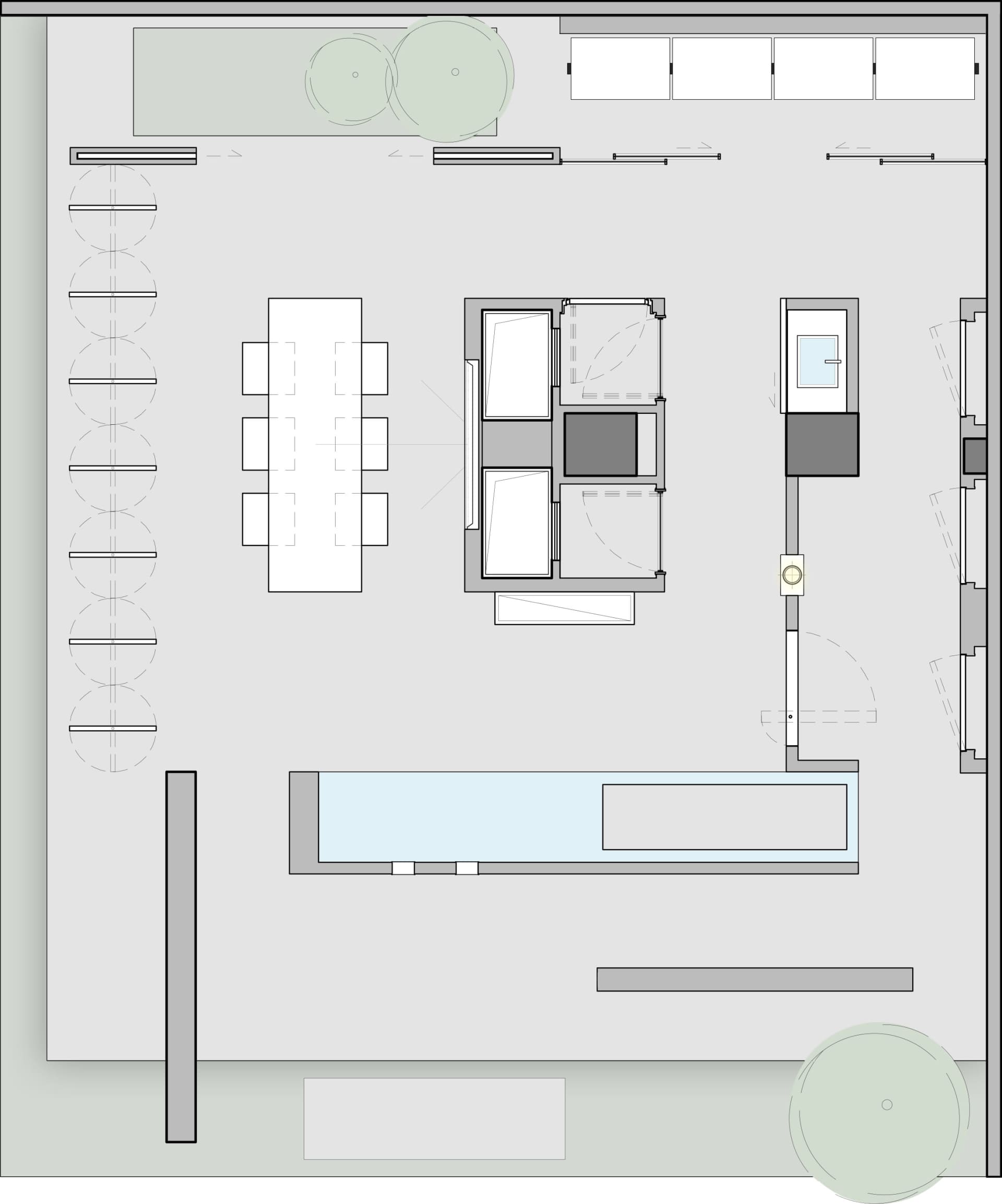 Modern office space with contemporary furniture layout, featuring white and grey color palette.
