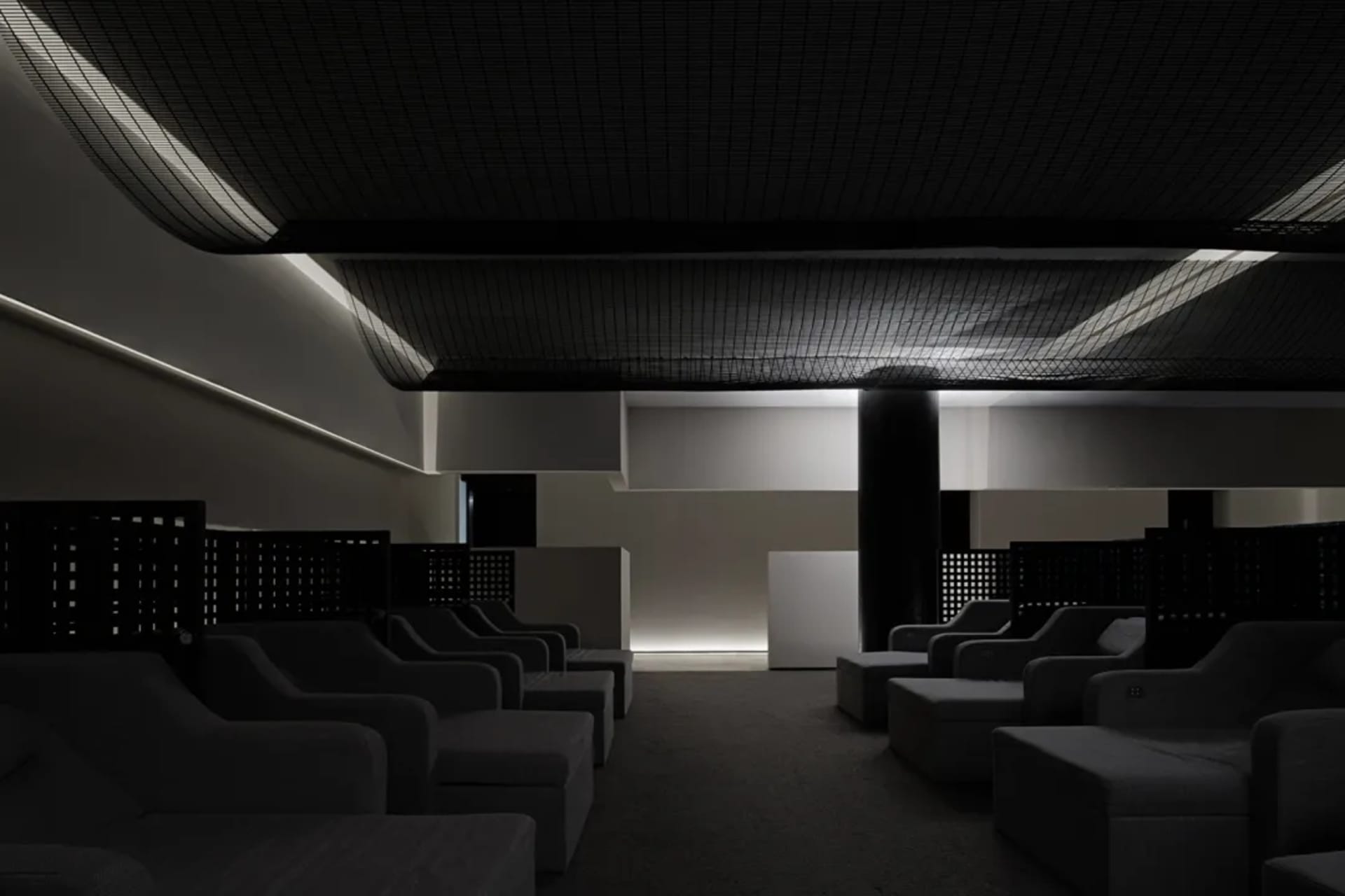 Modern seating arrangement with fabric upholstery in a contemporary interior space