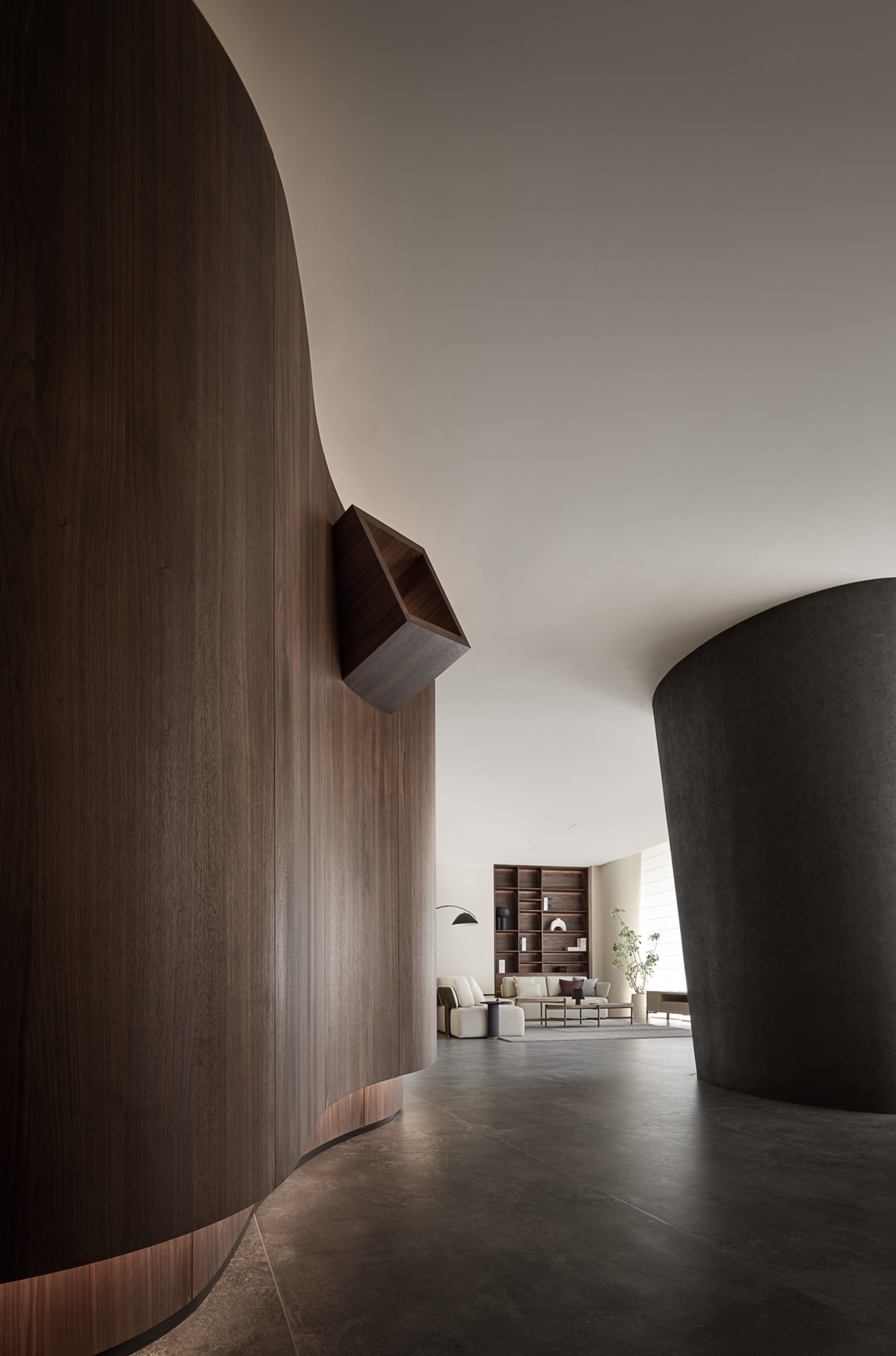 Modern living room with wooden walls and concrete floor