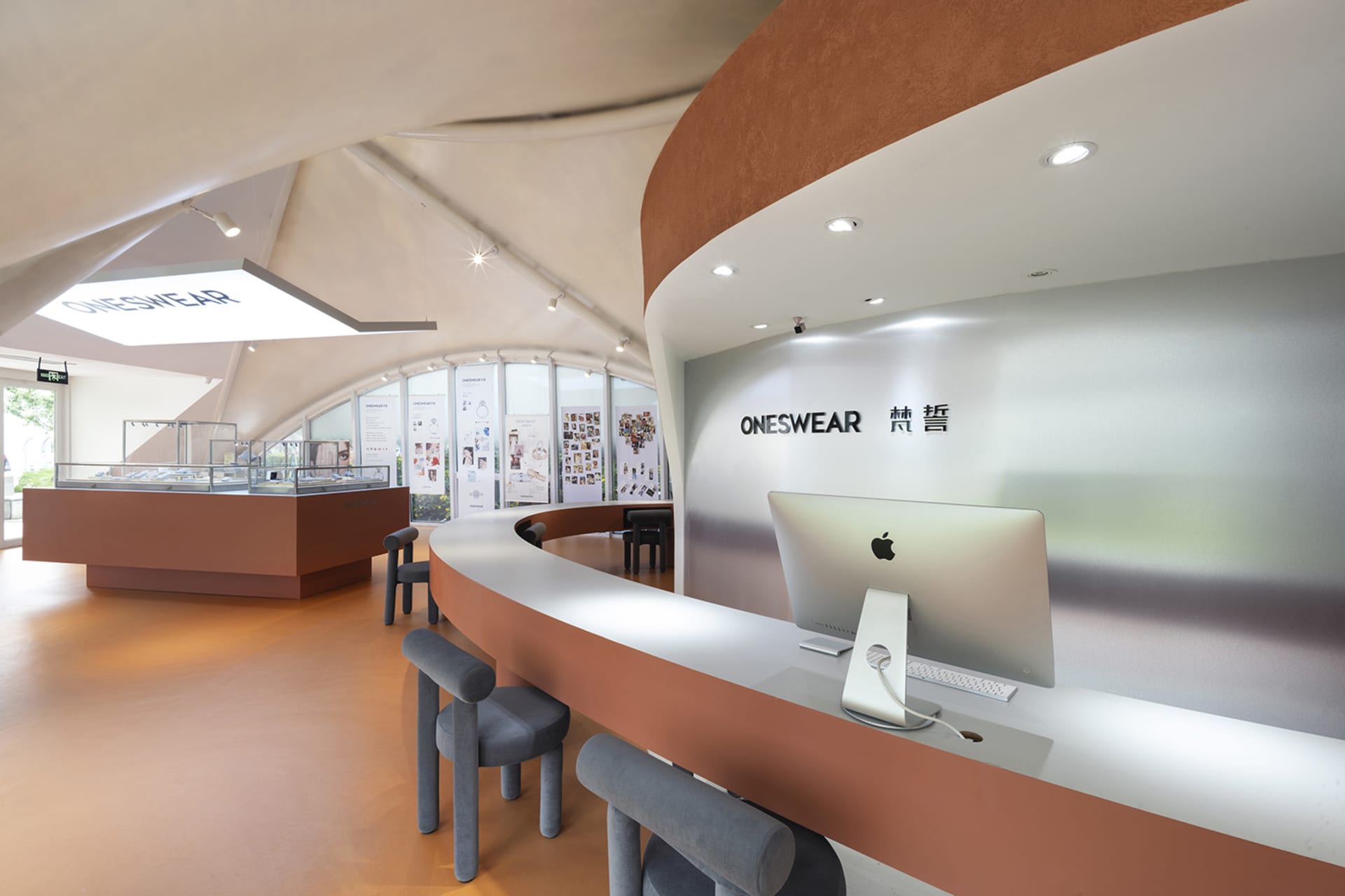 A modern retail storefront with white walls and a sleek design.