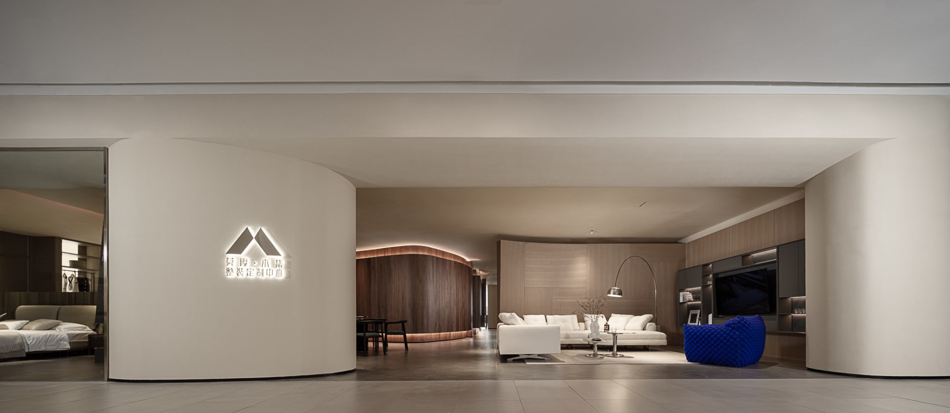 Modern living room with neutral-toned furniture and decor.